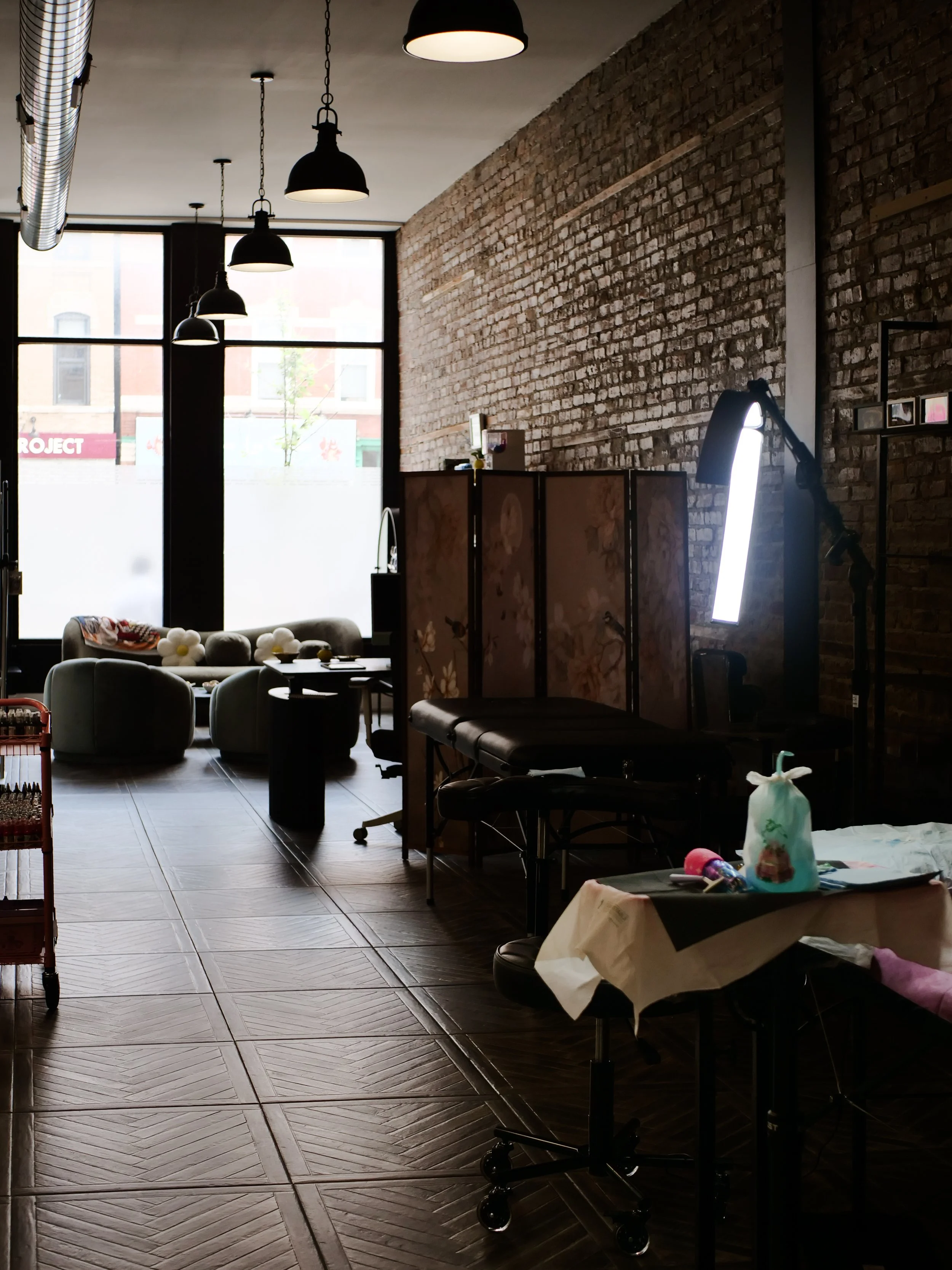 One of our tattoo stations looking into the front area.