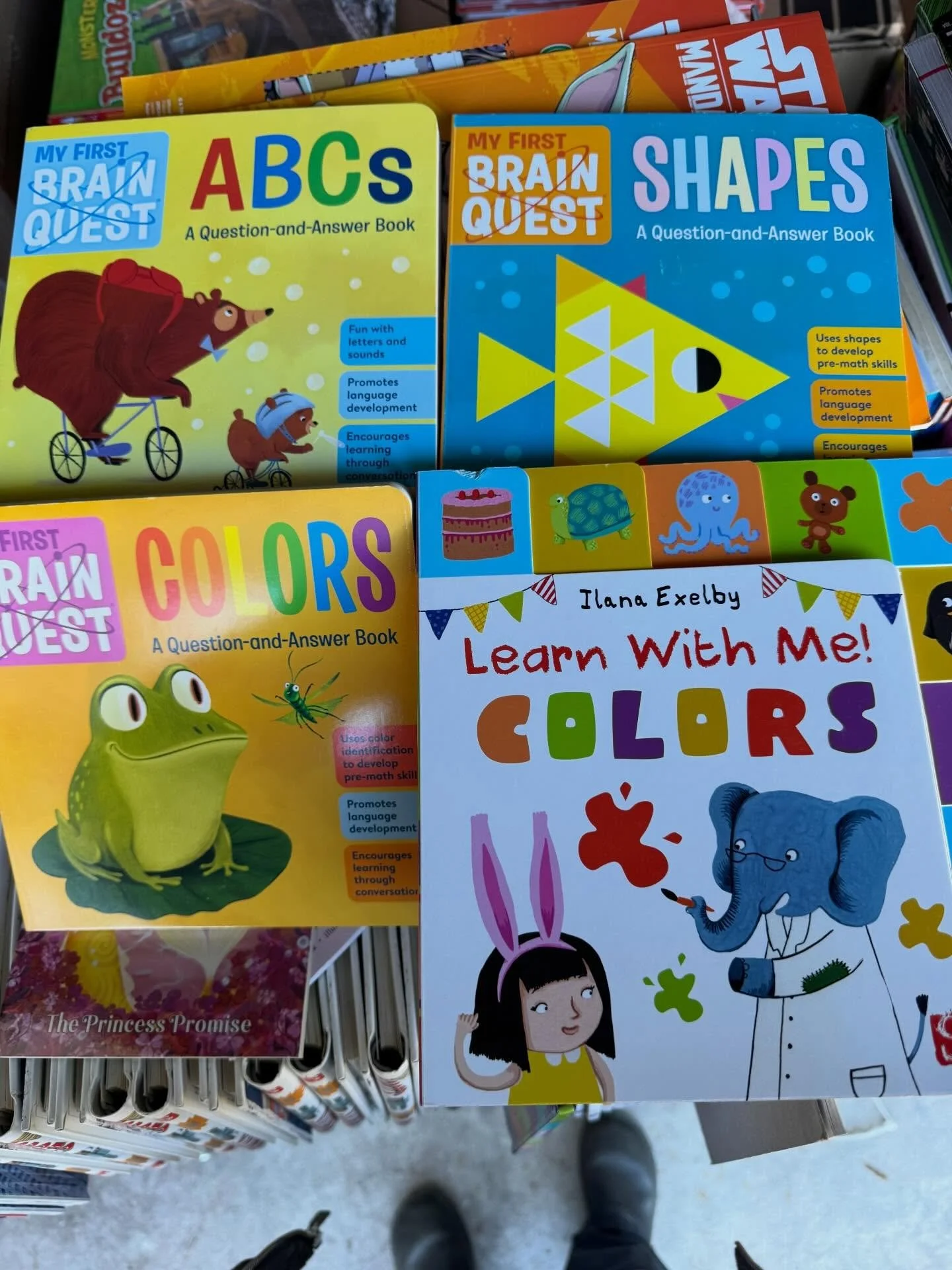 These are a few of the beautiful, brand-new books that will soon be hand-chosen by students, families, and teachers to build home and classroom libraries. Unboxing Day is one of our favorites!