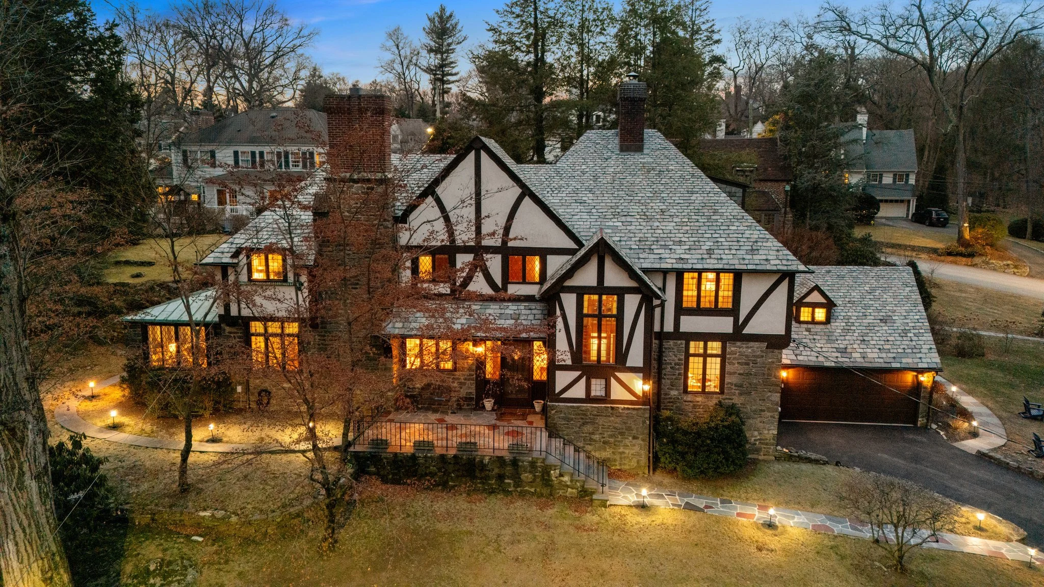 twilight-drone-photo-tudor-home-larchmont-westchester-ny.jpg