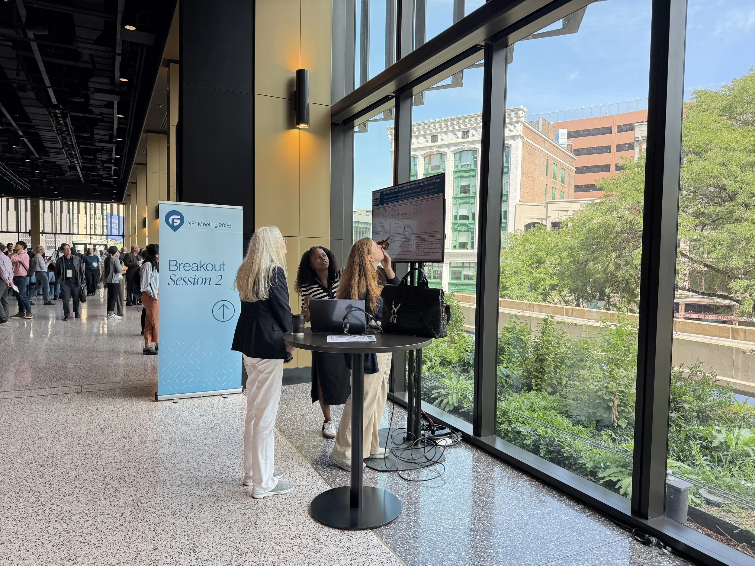 Chanell presenting her poster at the Gilbert meeting in Detroit. 