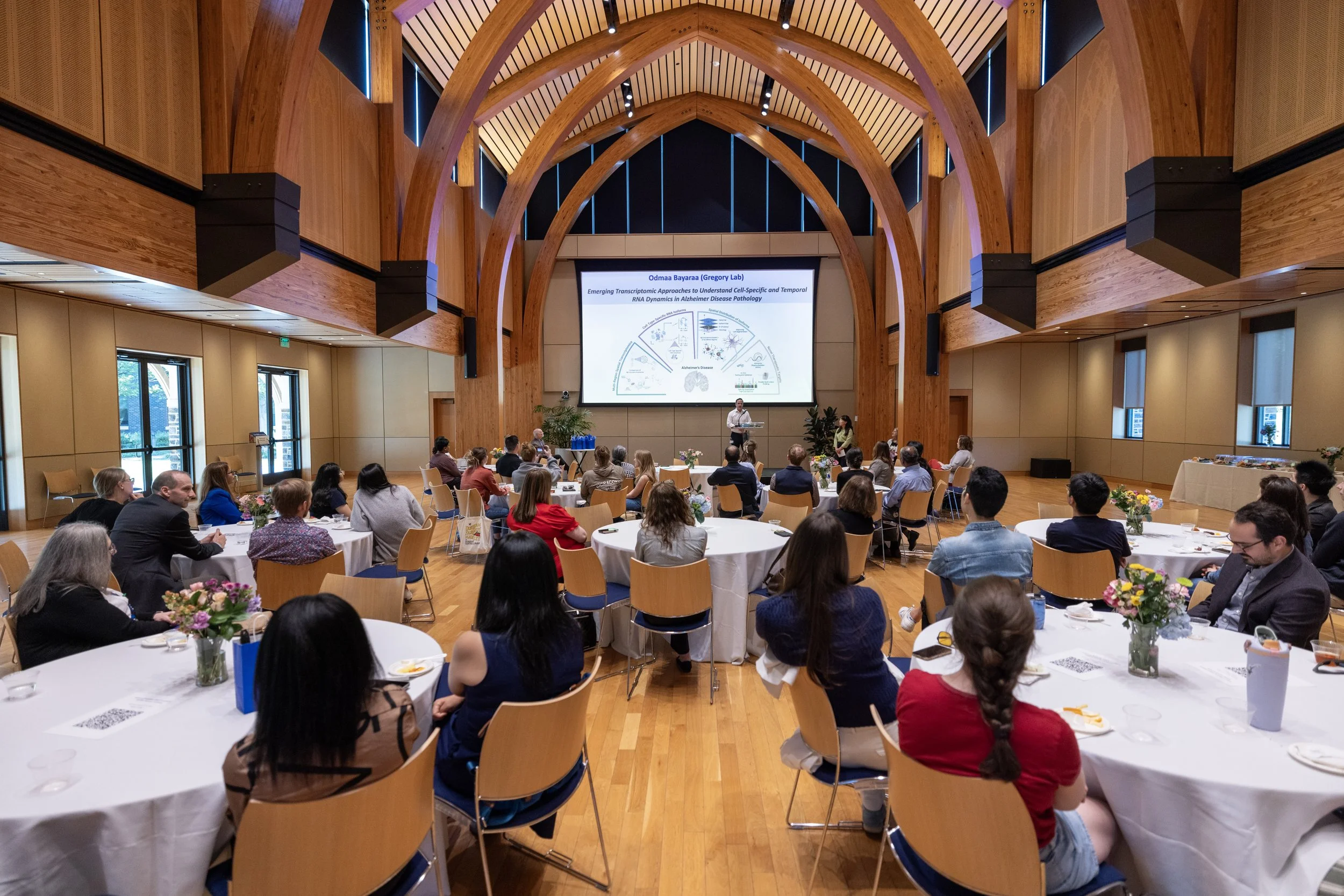 A view of the ceremony room and attendees taken from the back of the room.