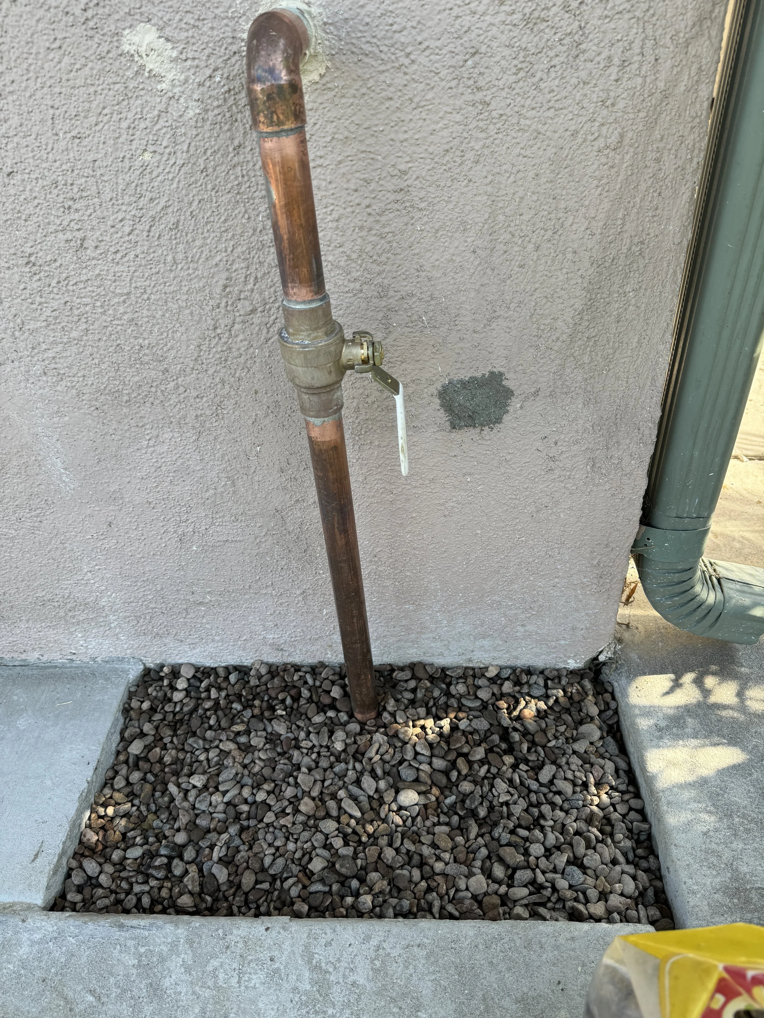 water service from the meter to the house. homeowner did not want a hose bibb here. No regulator was needed.