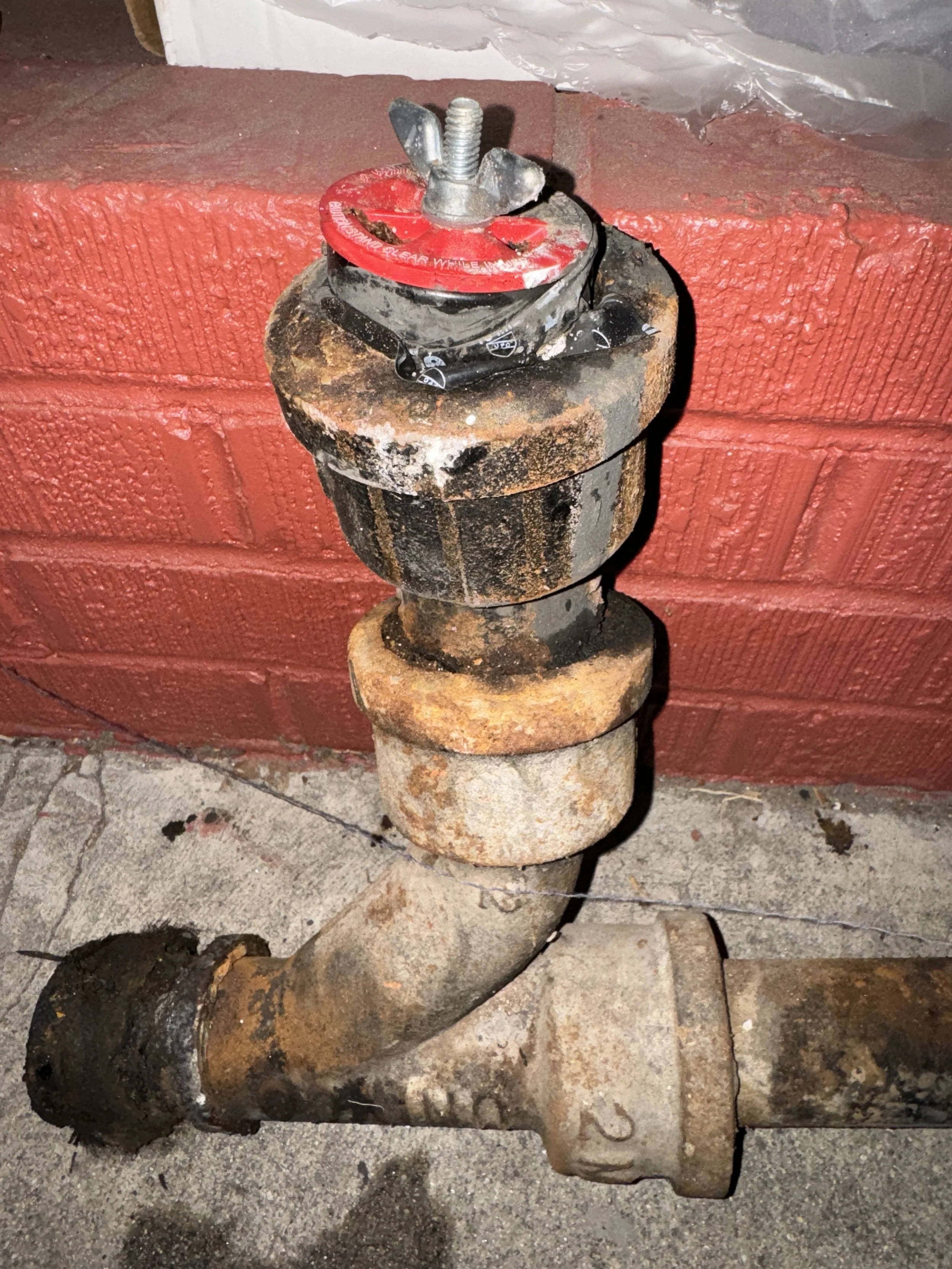 red plug had been leaking in the wall for some time.