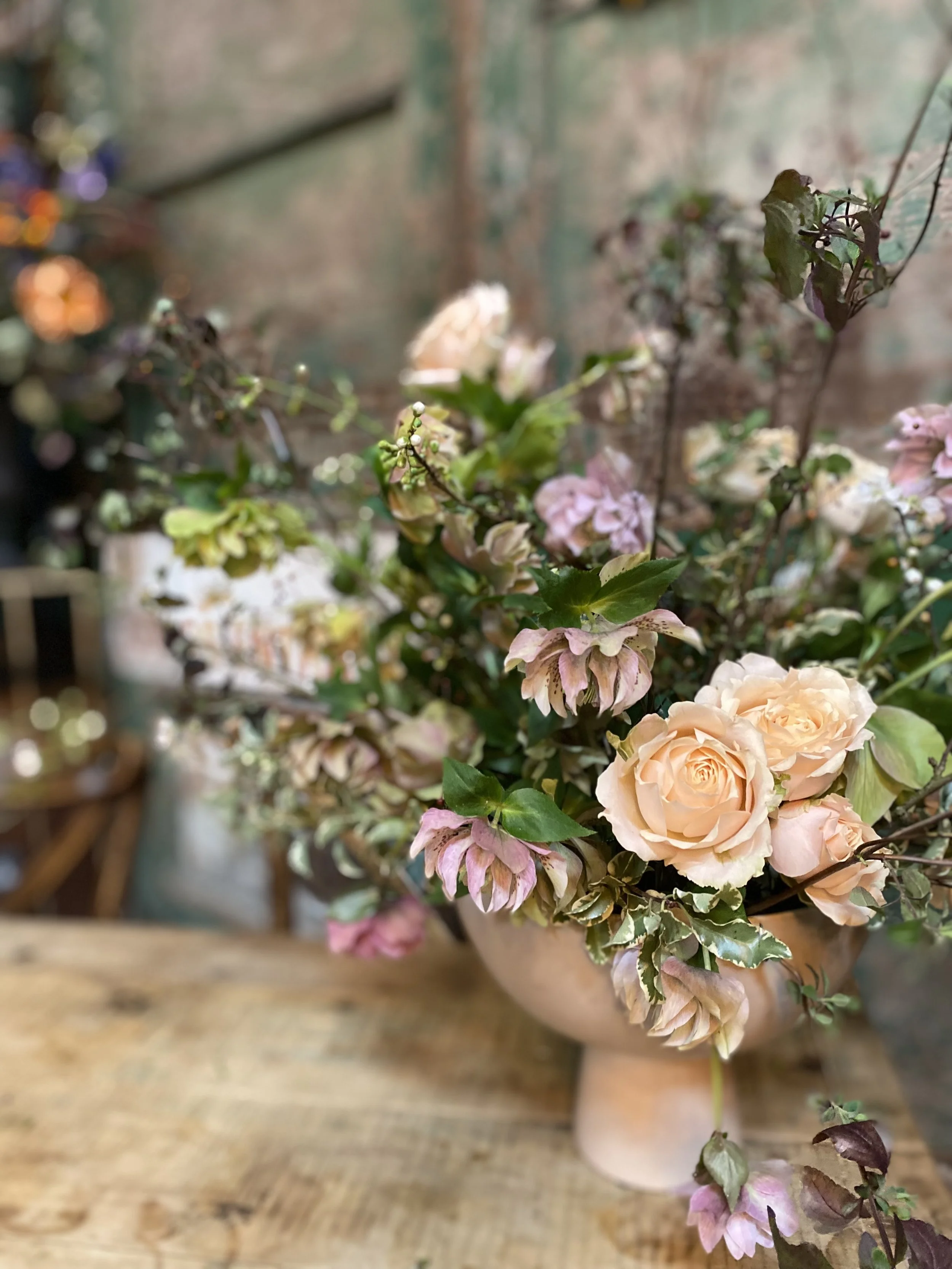 spring flowers in a footed bowl