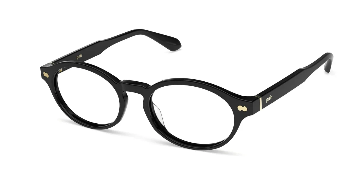 nomi-black-acetate-gold-metal-angle.webp