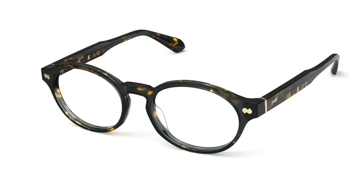 nomi-vintage-brown-acetate-gold-metal-angle.webp