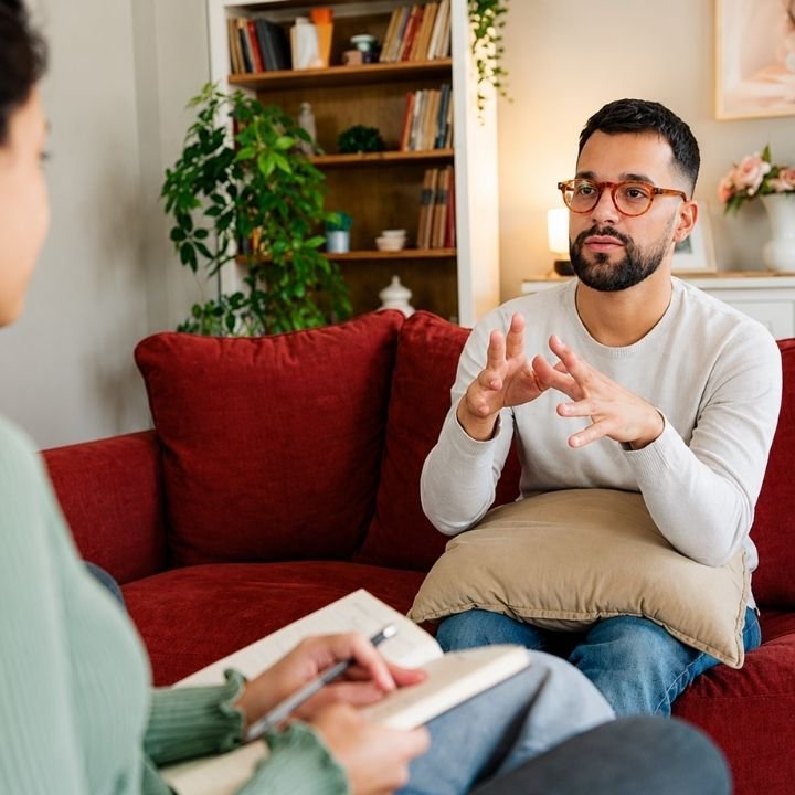Clinician explaining cognitive assessment results during an autism evaluation.