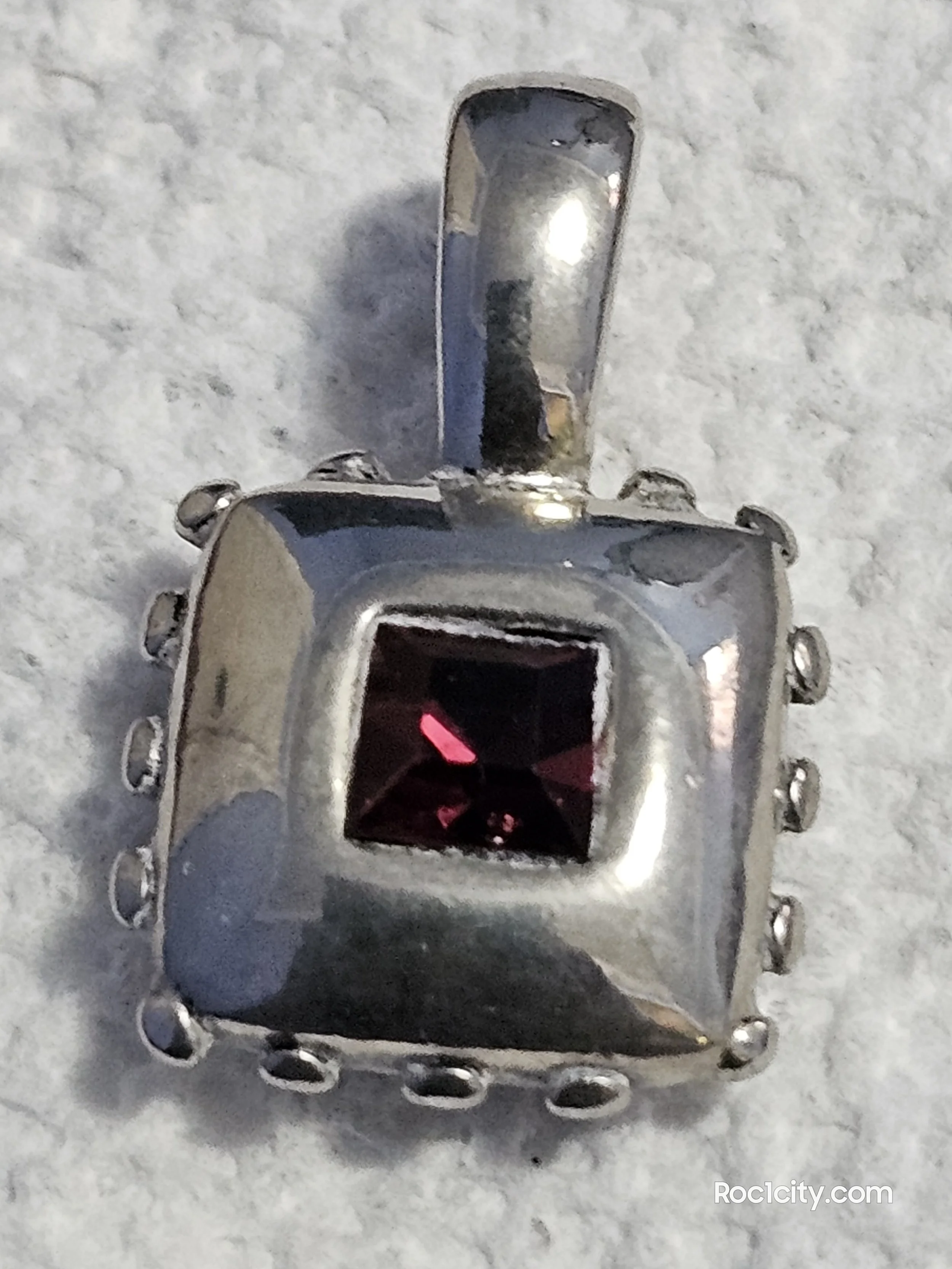 Rolled silver tone necklace