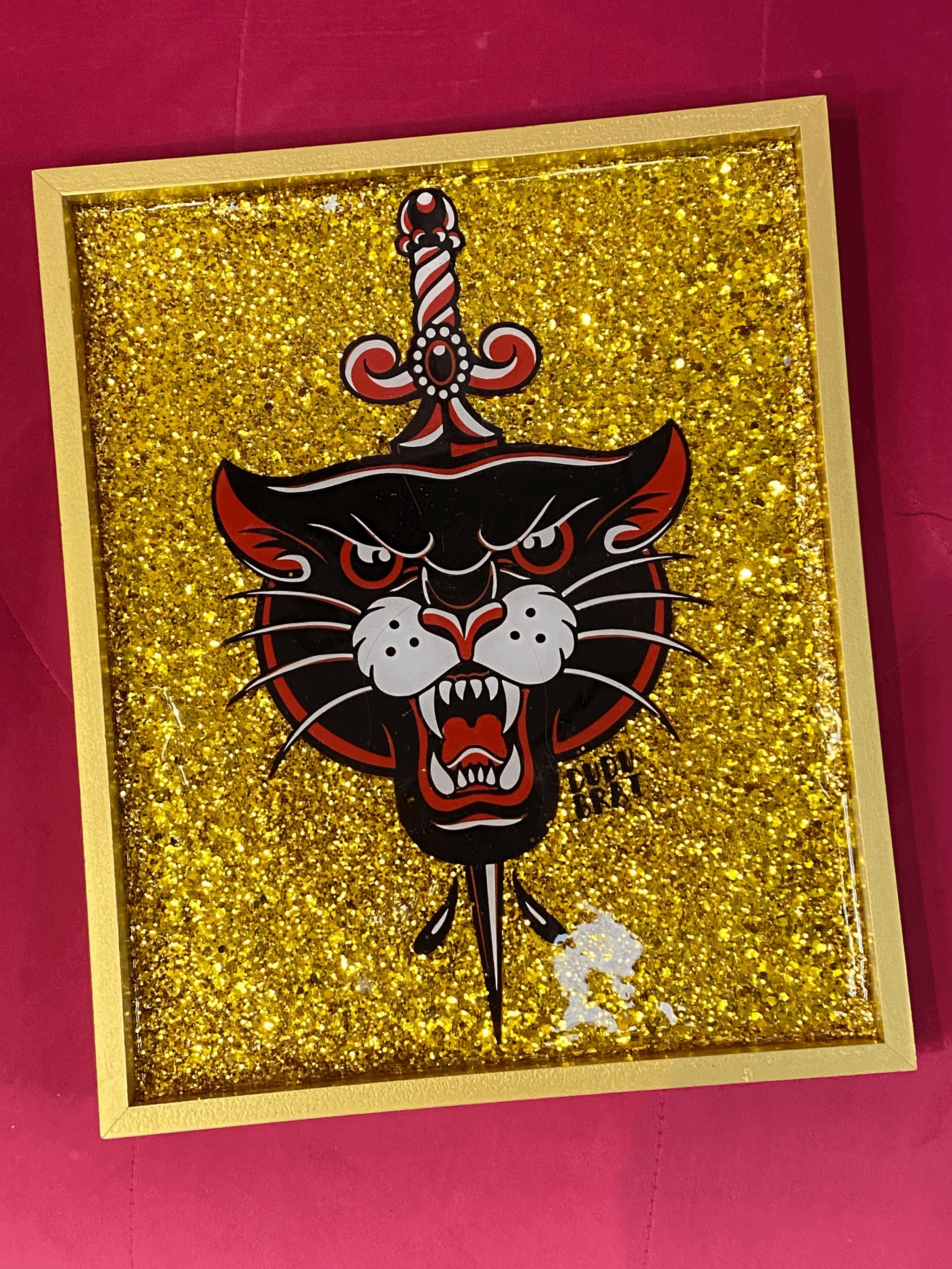 Panthers in Gold frames