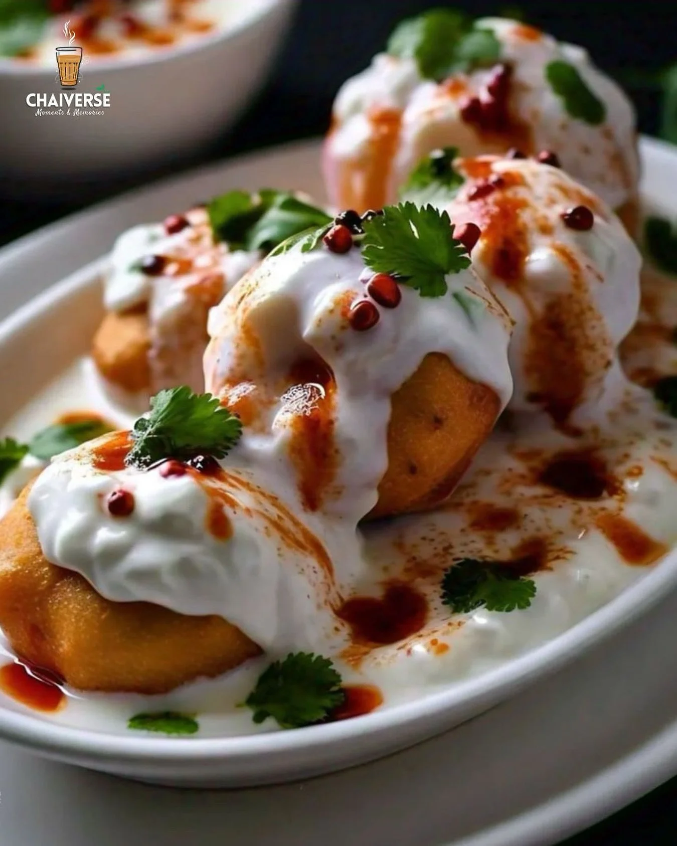 Come explore the deliciousness of Dahi Vada! 🌟 These soft, spongy lentil dumplings are soaked in creamy yogurt and topped with tangy tamarind chutney and zesty spices. Perfect for a snack or appetizer, each bite is a burst of flavor that will leave 