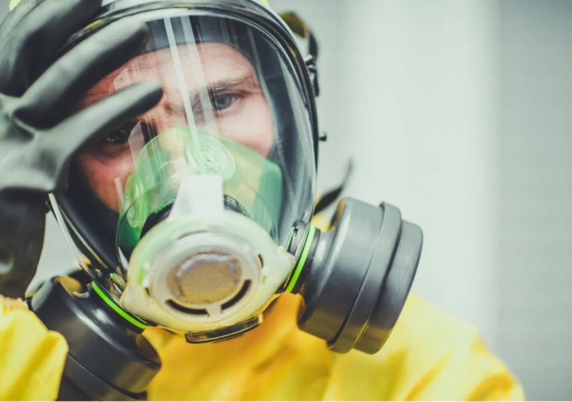 A worker with a professional mask