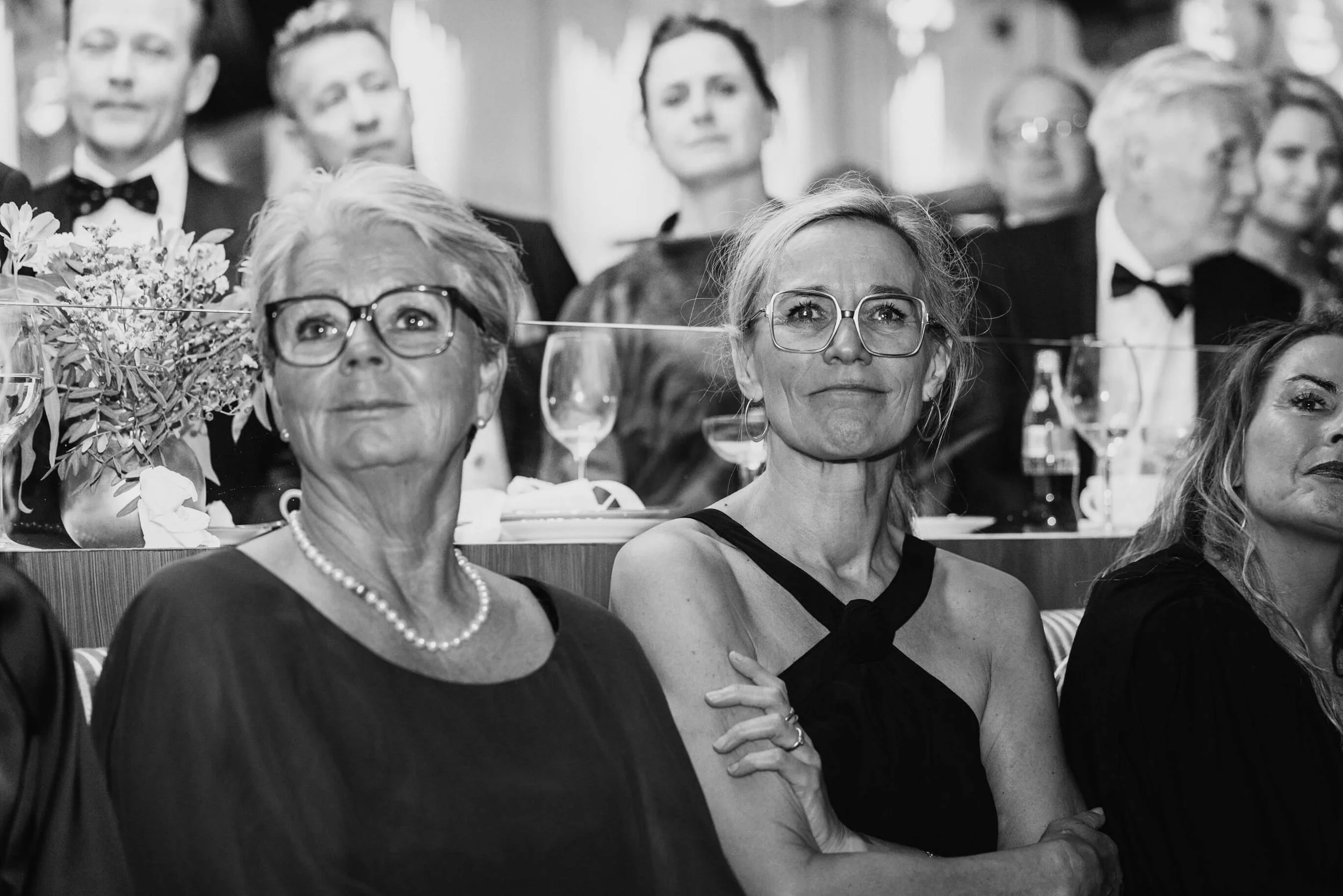 Wedding guests watching an emotional live performance at Café Opera in Stockholm