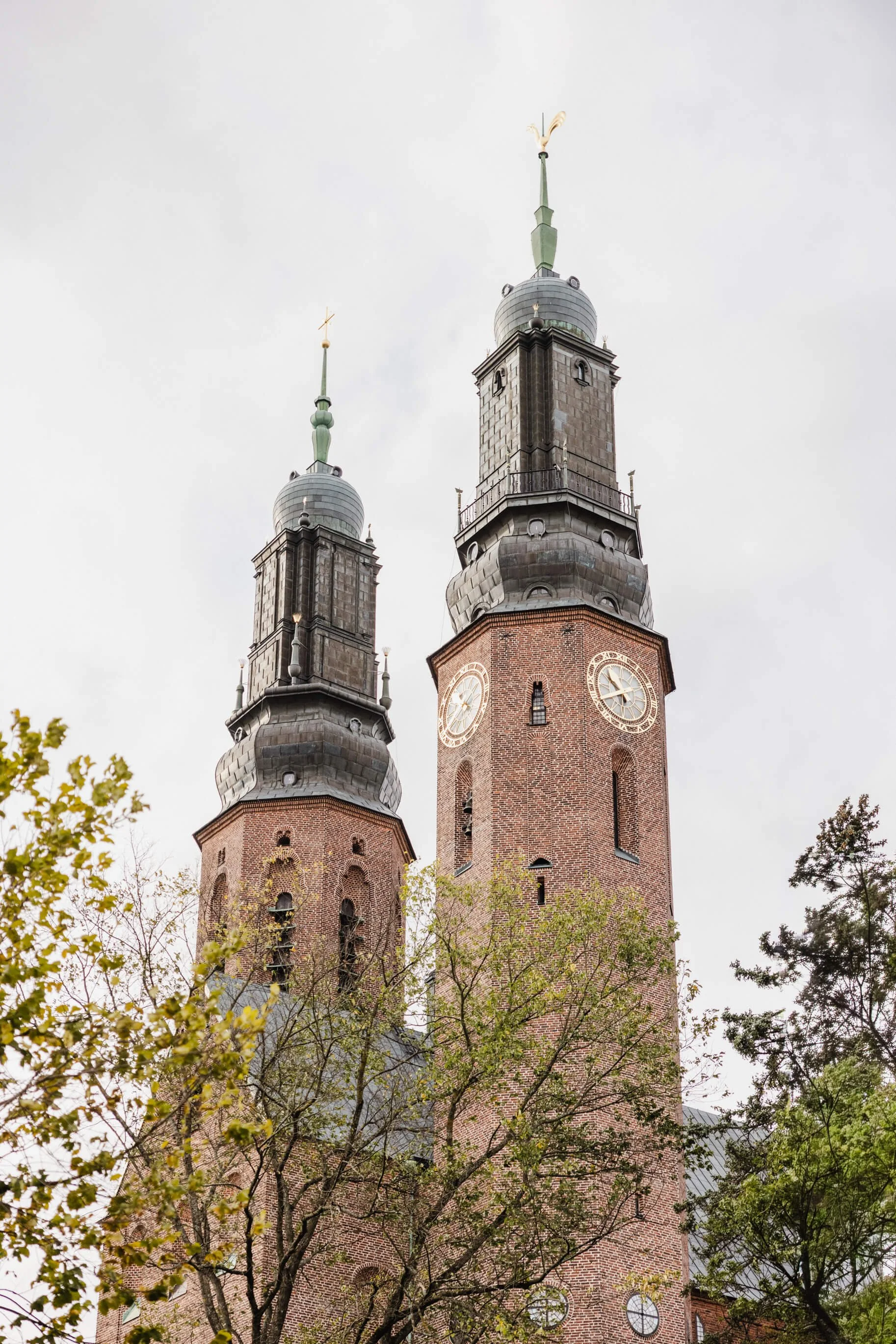 Twin towers of Högalidskyrkan before Vanessa and Jens’s Stockholm wedding ceremony