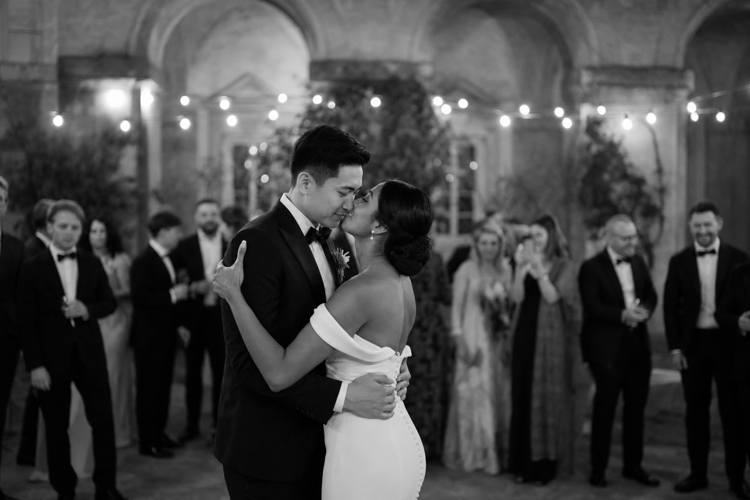 Bride and groom sharing their first dance at Villa Cetinale during an evening wedding reception in Tuscany.