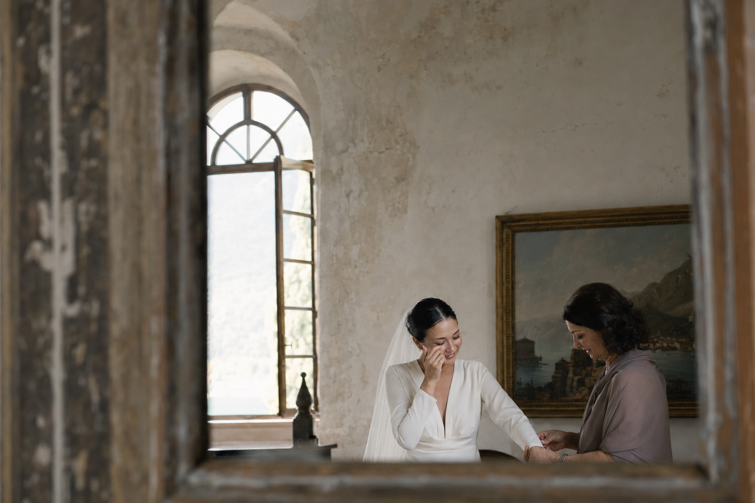 Bride getting ready with her mother before an Italian destination wedding, a meaningful moment often captured by a second wedding photographer