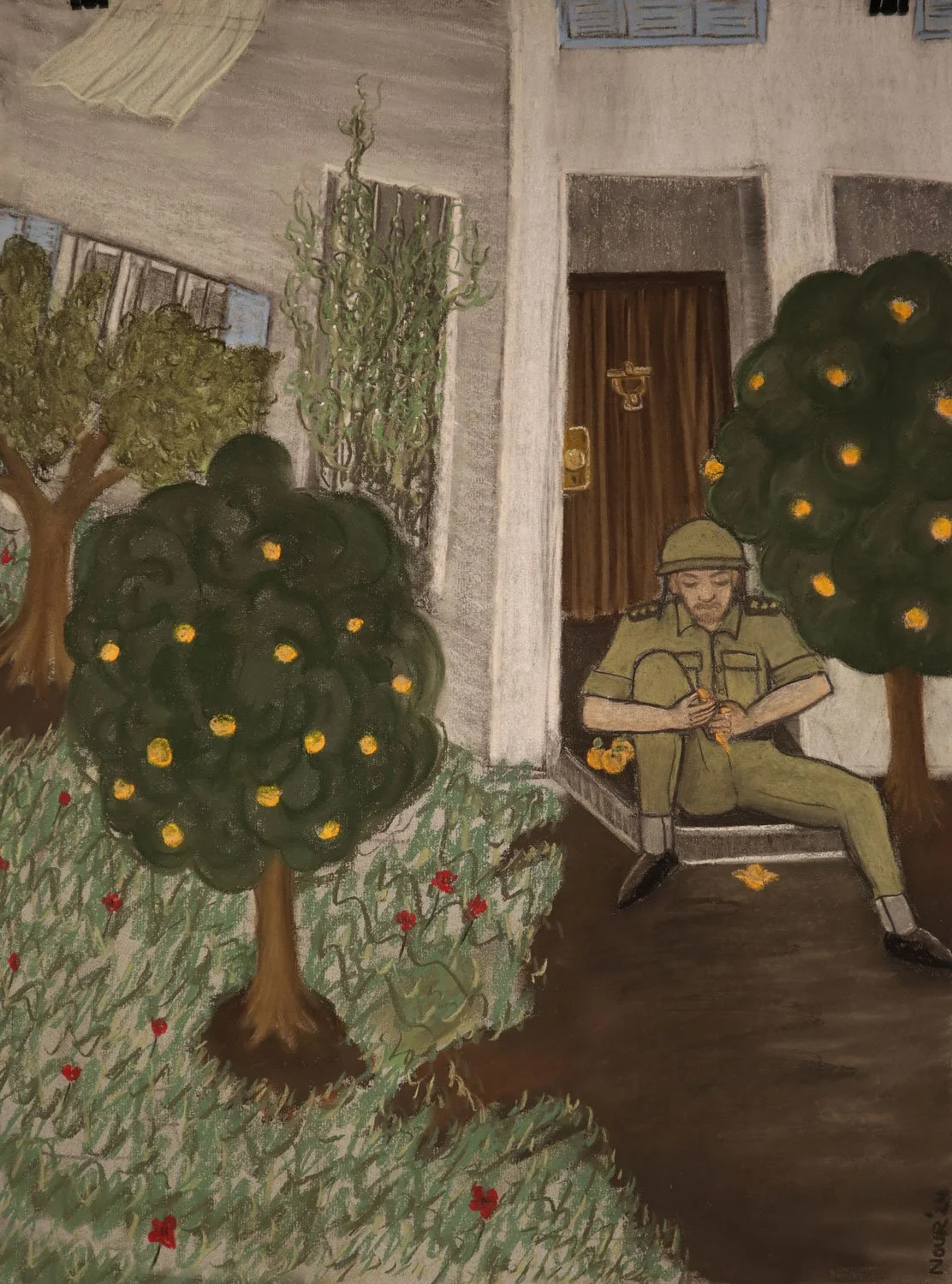 Soldier eating a clementine