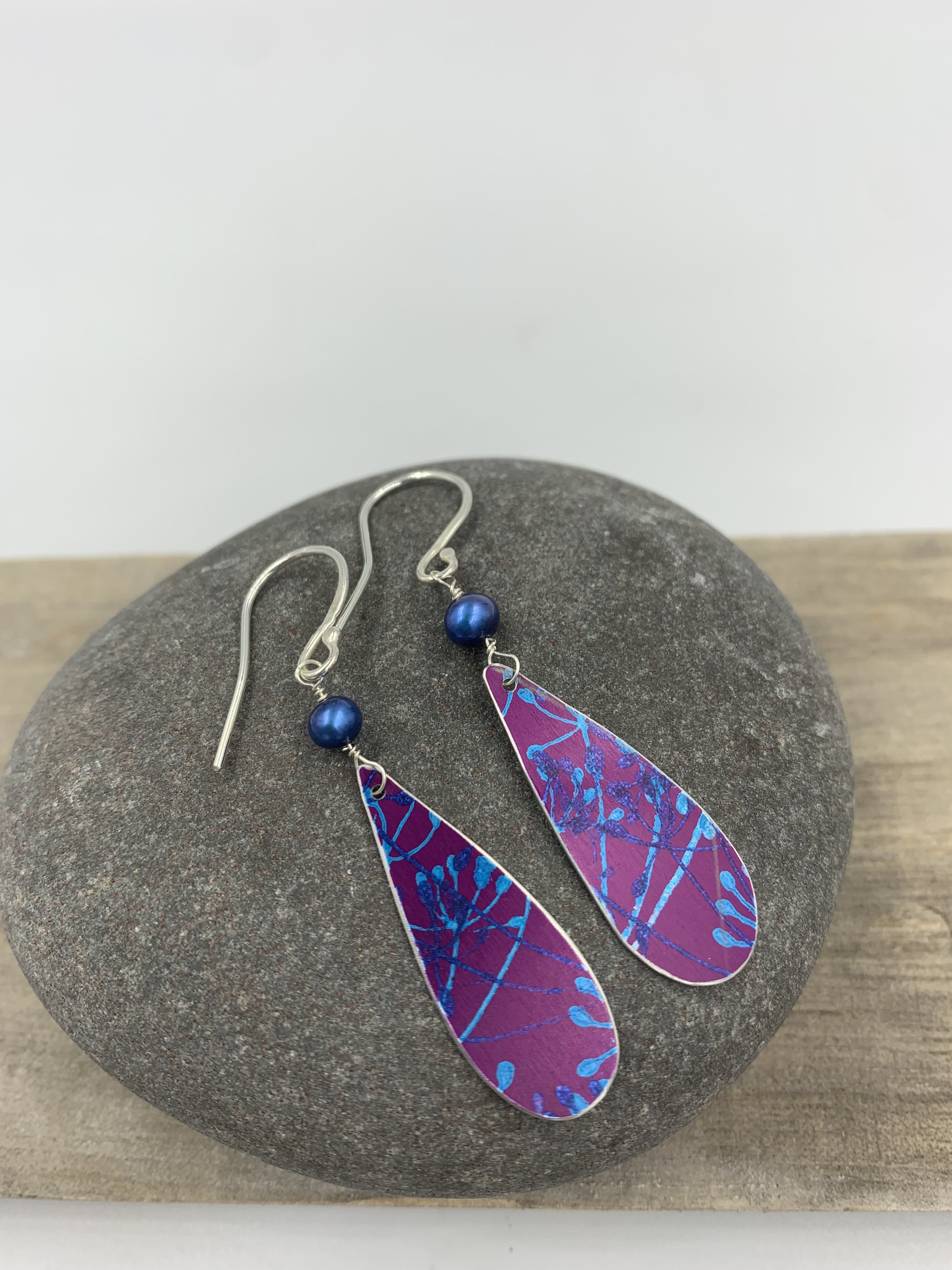 pink cow parsley print drop earrings with blue pearl