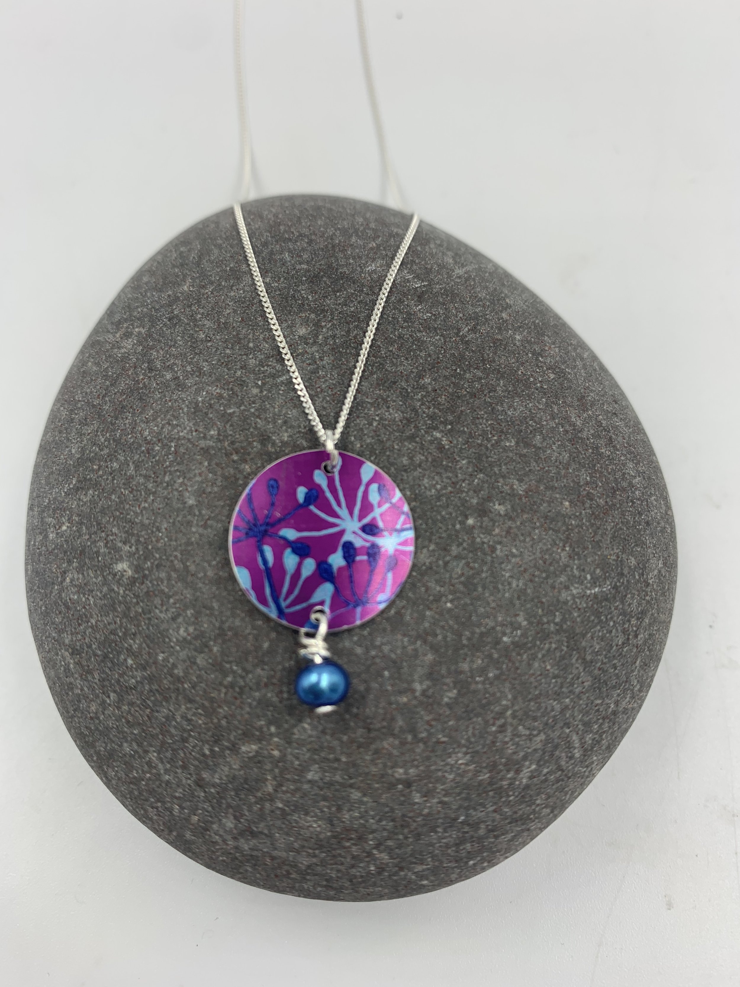 pink cow parsley print circle necklace with blue pearl