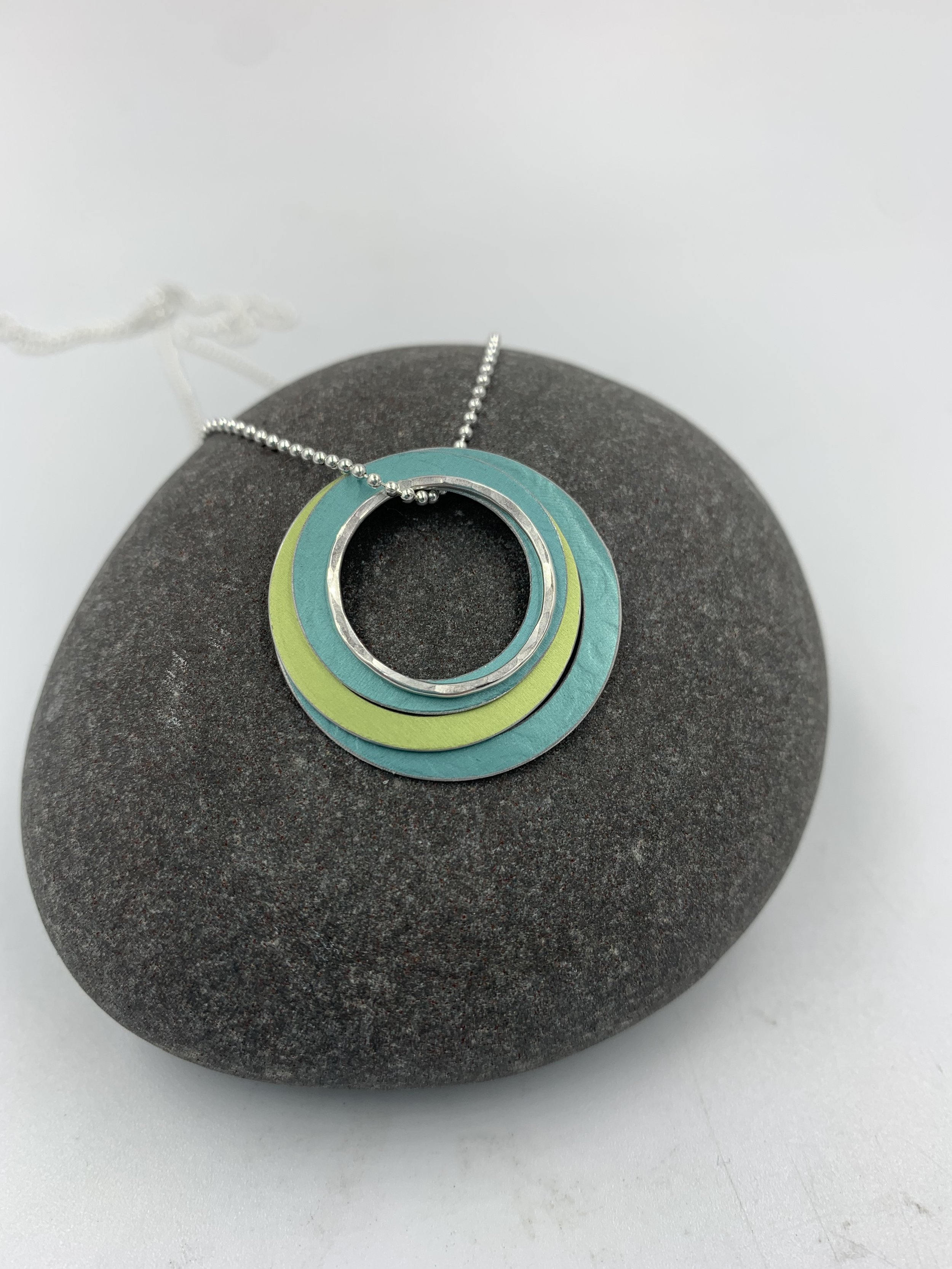 Ripple pendant in teal lime green and silver