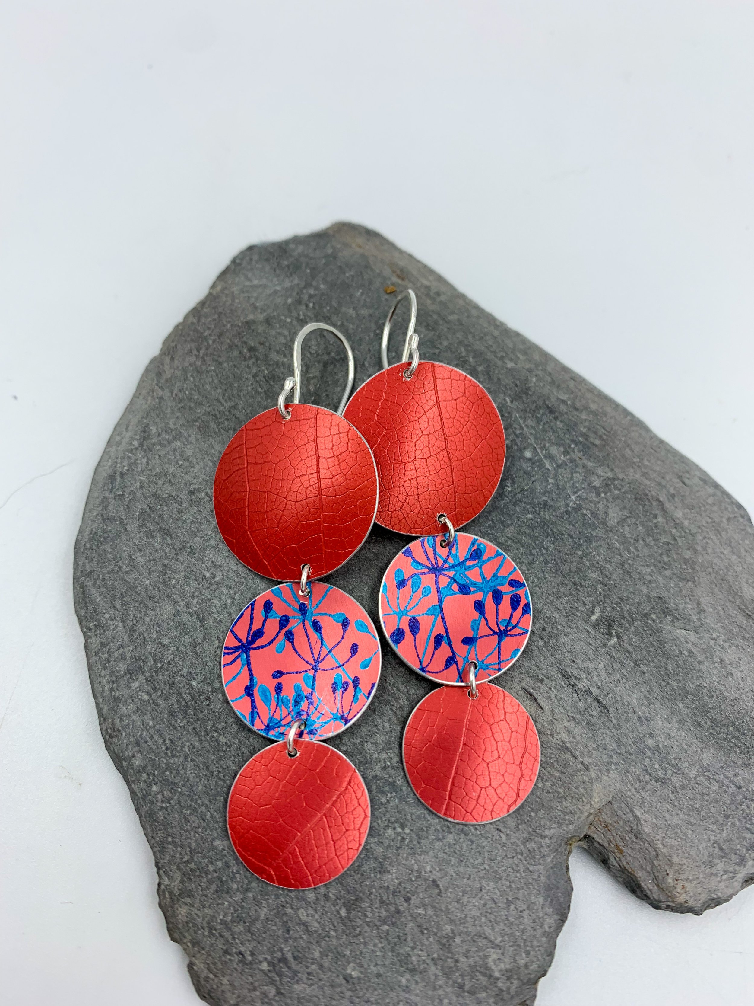 leaf textured 3 circle red dangly earrings with cow parsley print