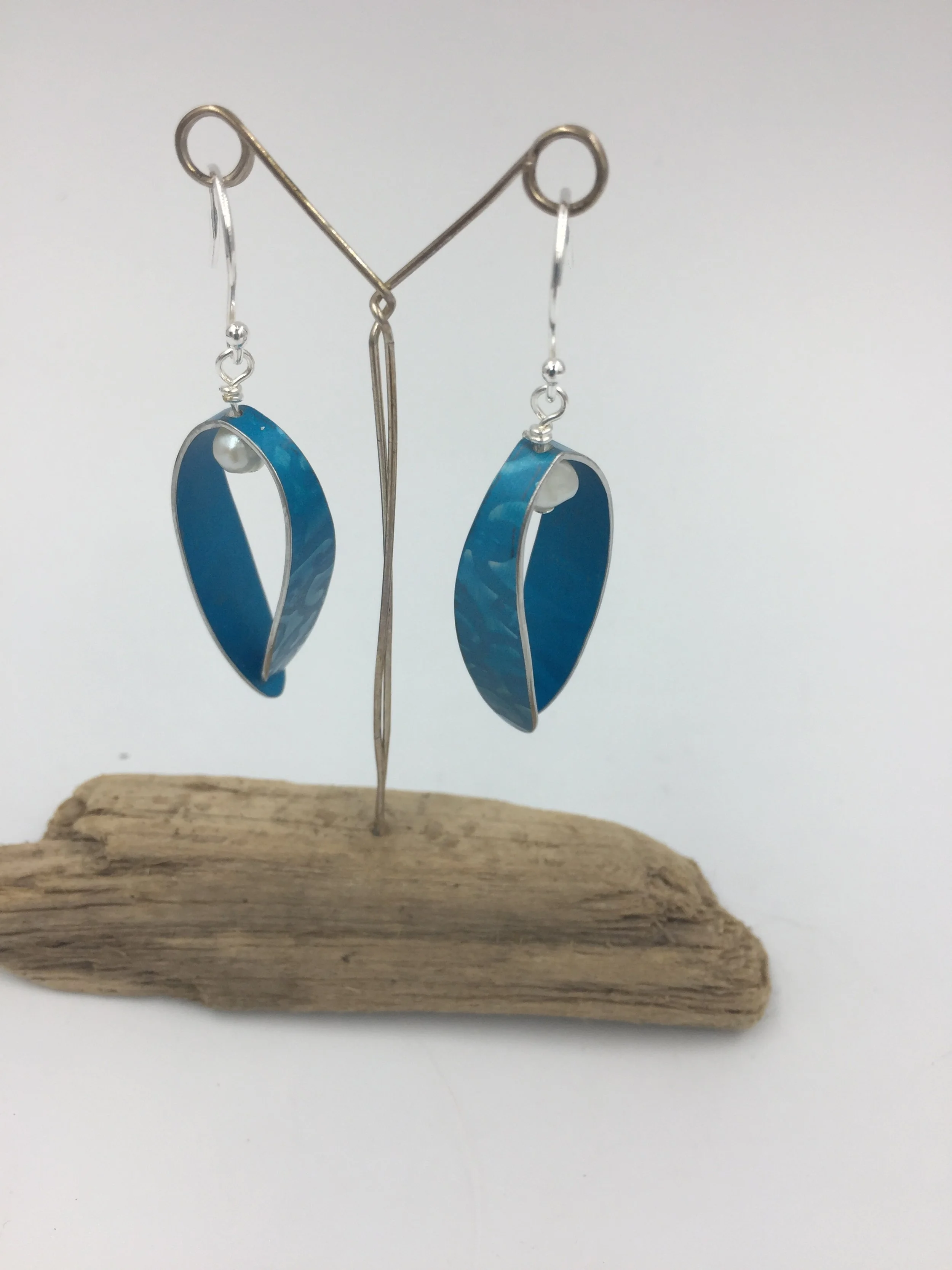 berry earrings with white pearl. curved leaf with white pearl berry on sterling silver hooks