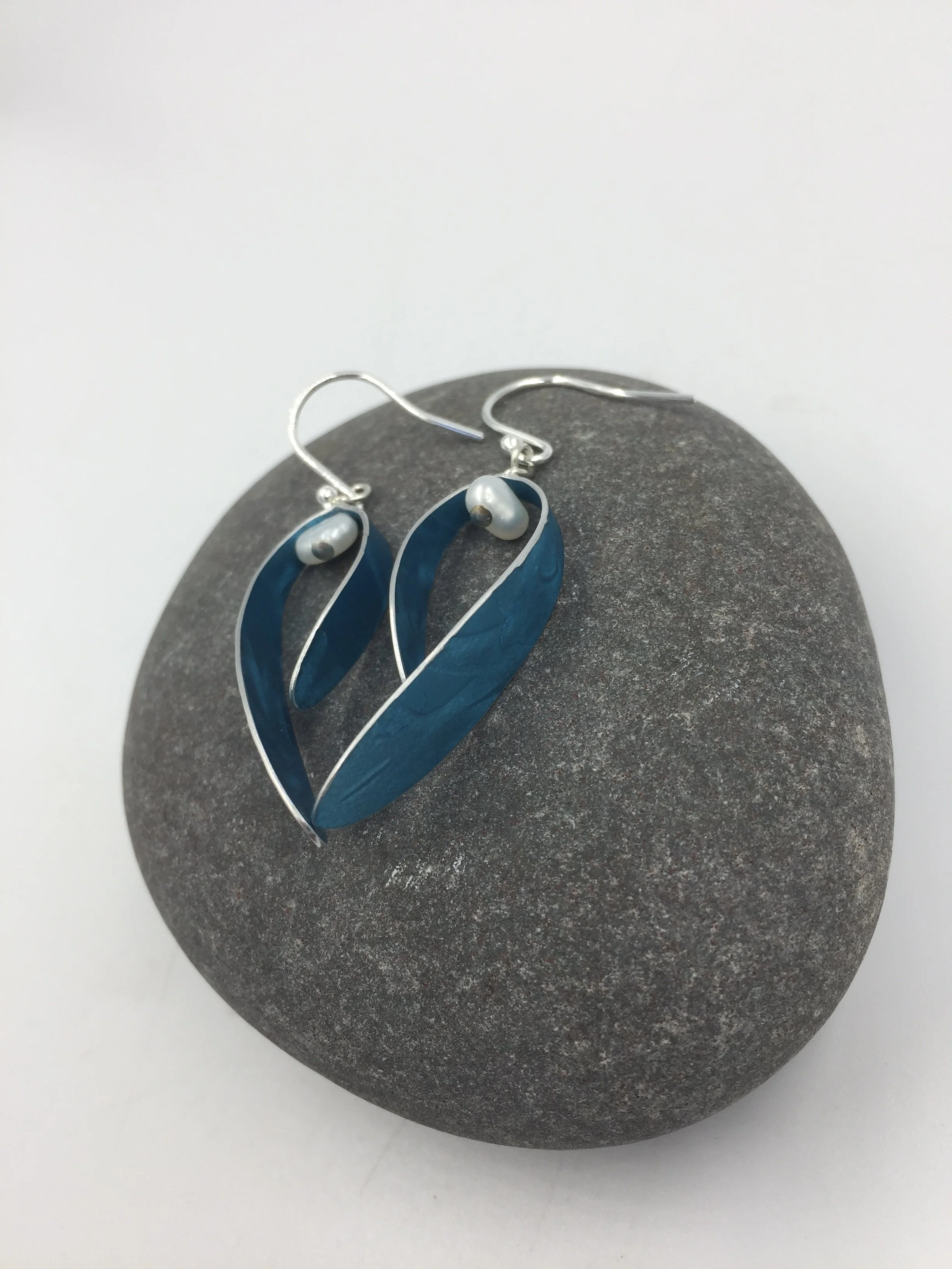 berry earrings with white pearl. curved leaf with white pearl berry on sterling silver hooks