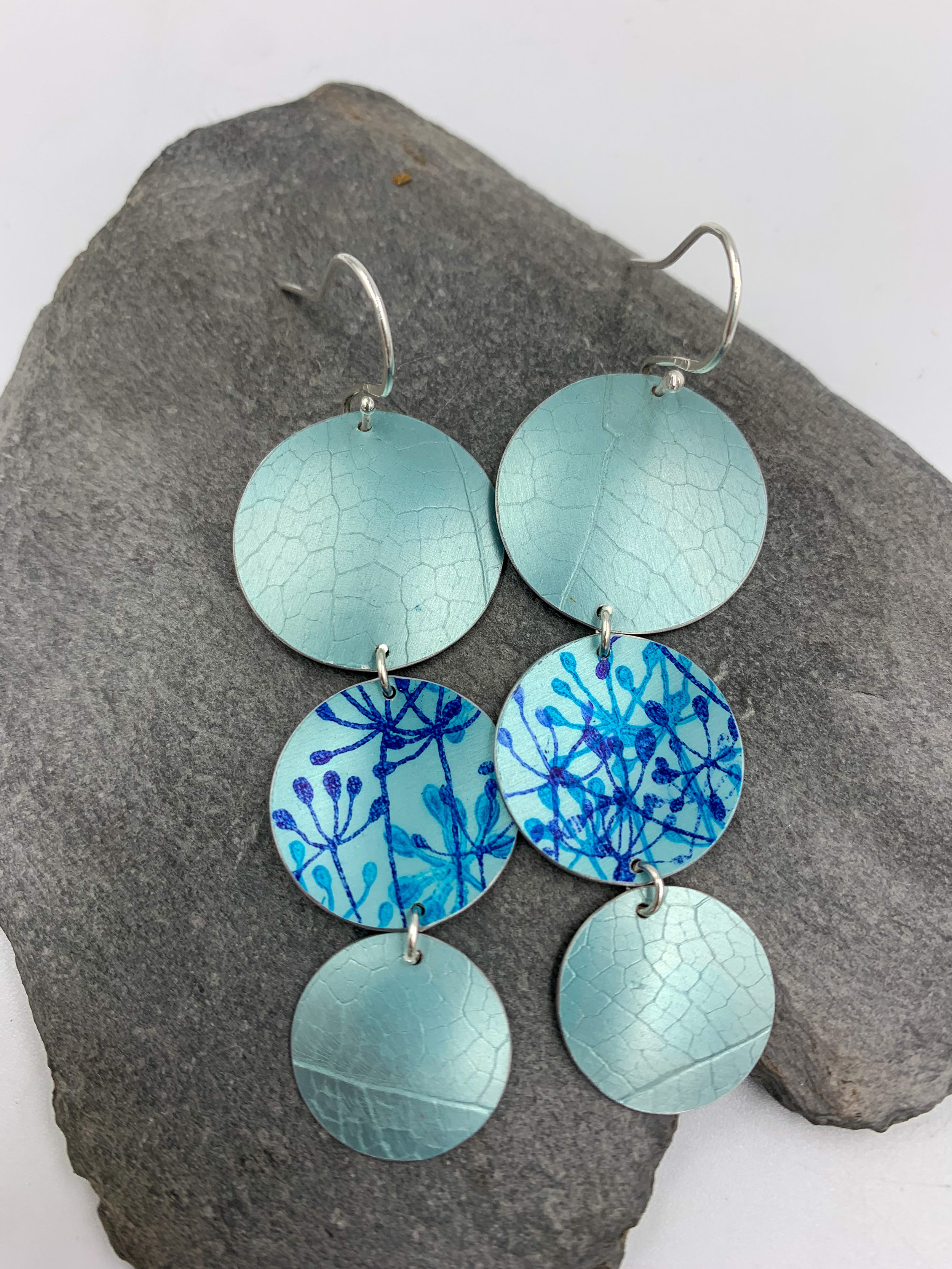 leaf textured 3 circle teal dangly earrings with cow parsley print