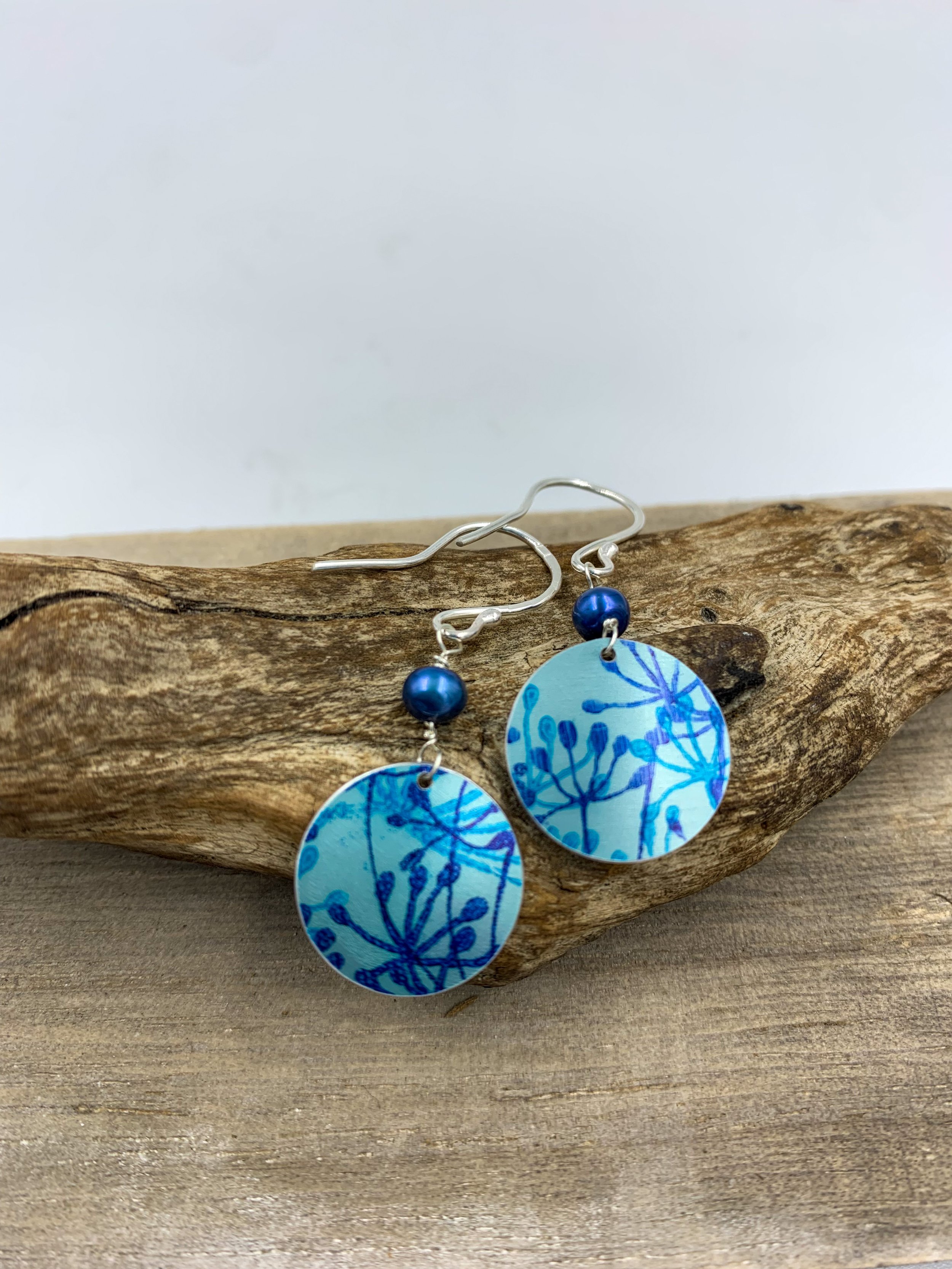 teal cow parsley print circle earrings with blue pearl