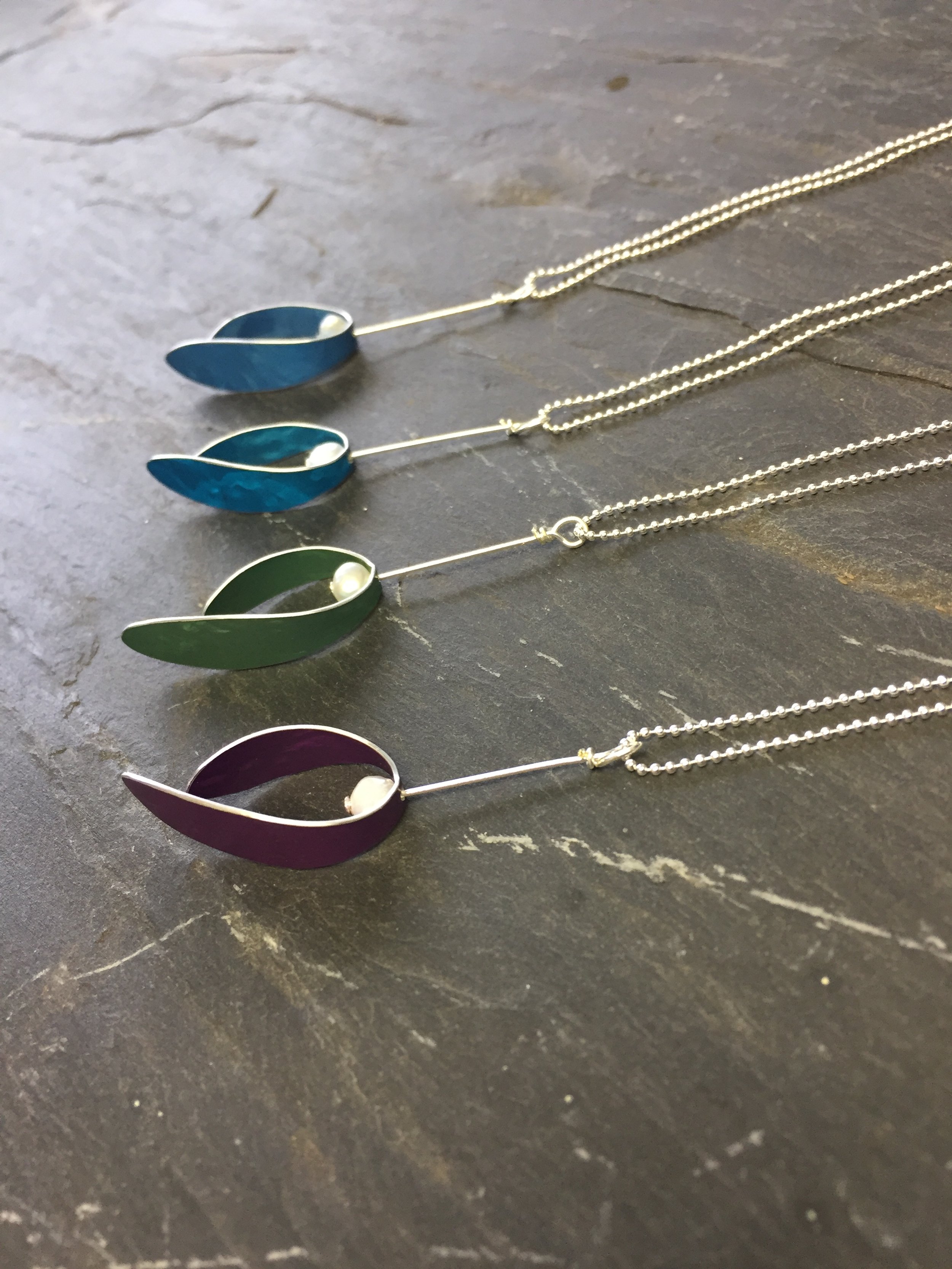 berry pendant with white pearl. curved leaf with pearl berry on sterling silver chain