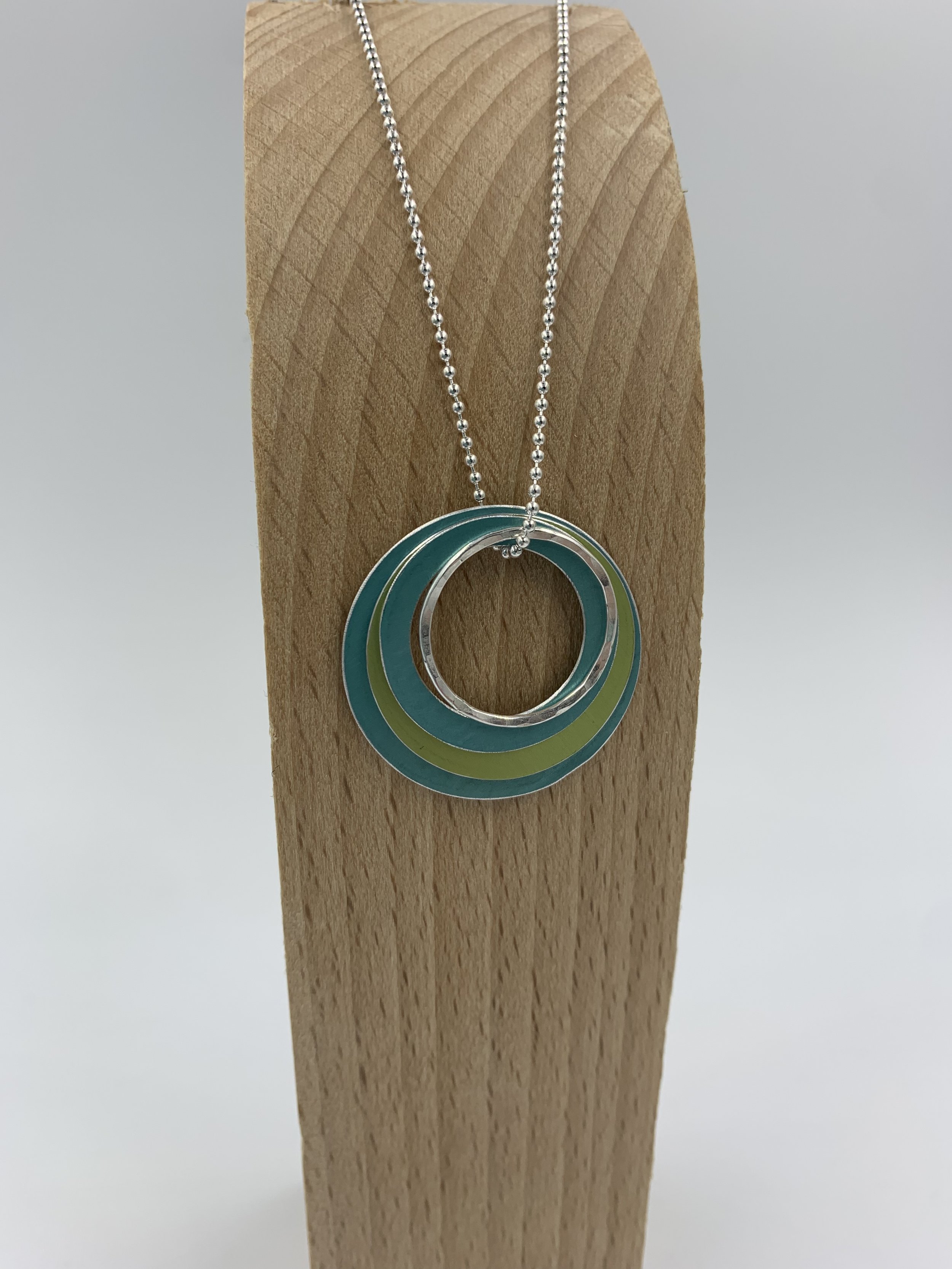 Ripple pendant in teal lime green and silver