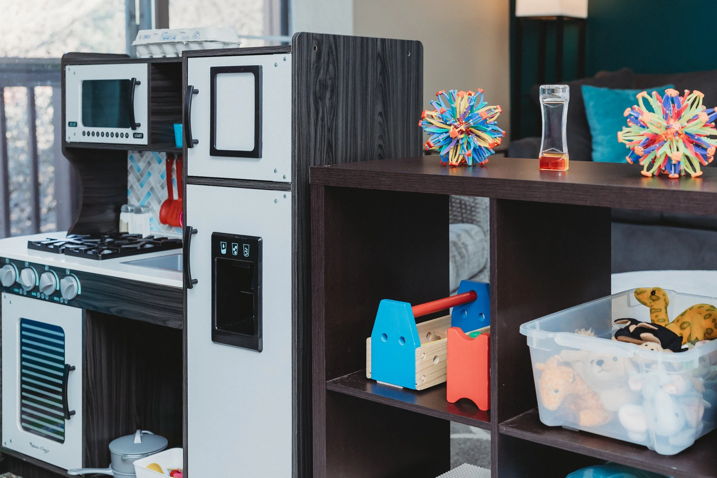 play therapy kitchen play with tools and stuffed animals and fidgets