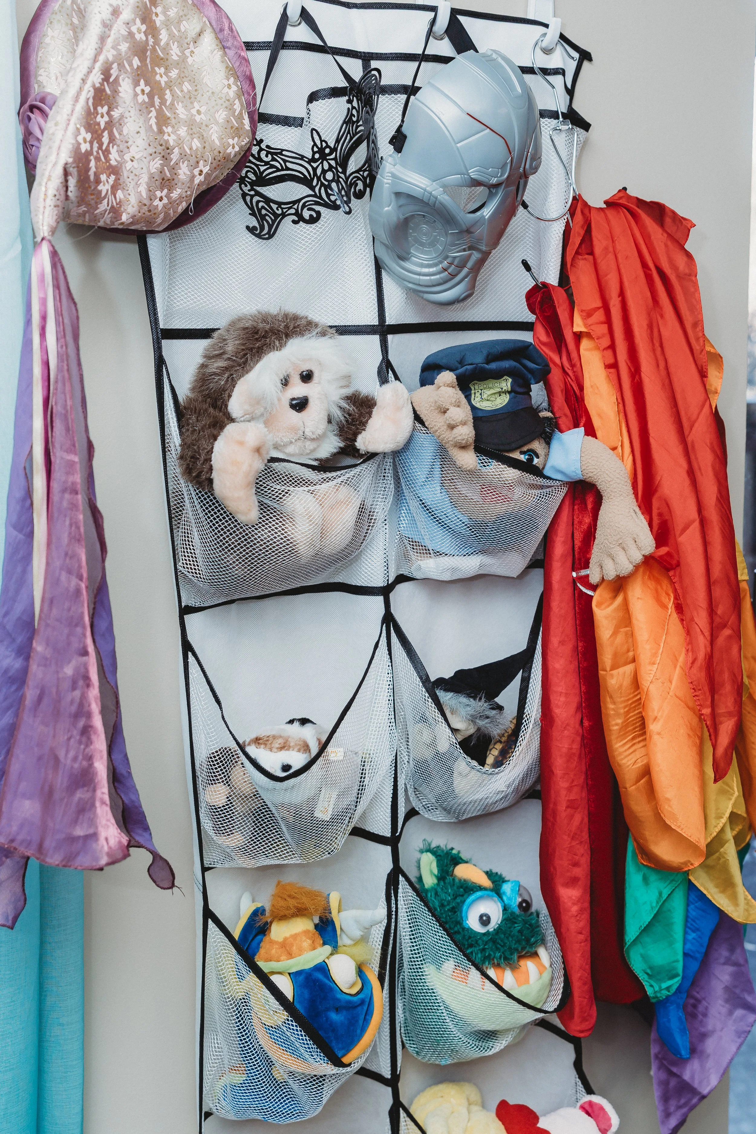 dress up items with puppets and masks for play therapy