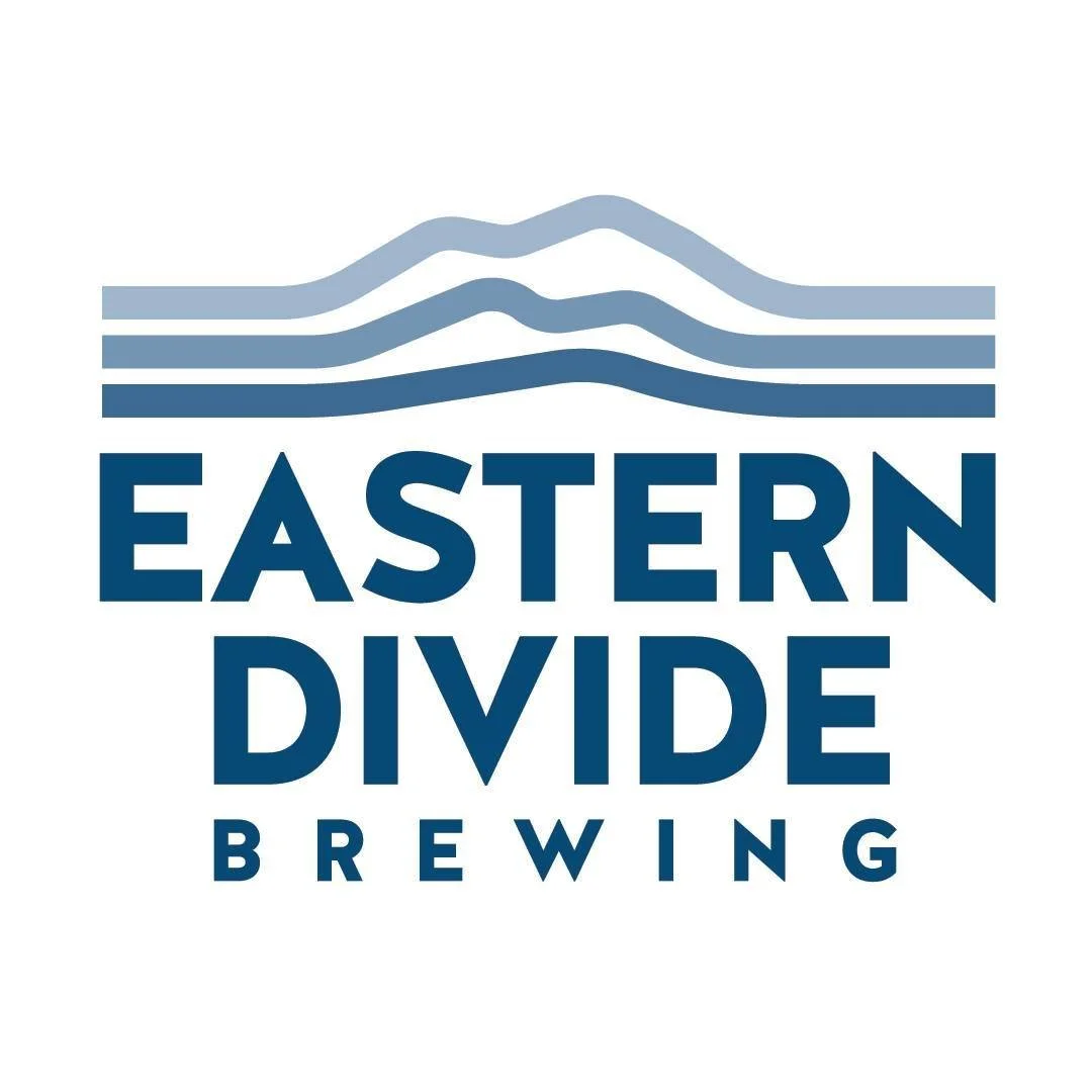 Logo for Eastern Divide Brewing featuring stylized mountain lines above the brewery name in bold blue font.
