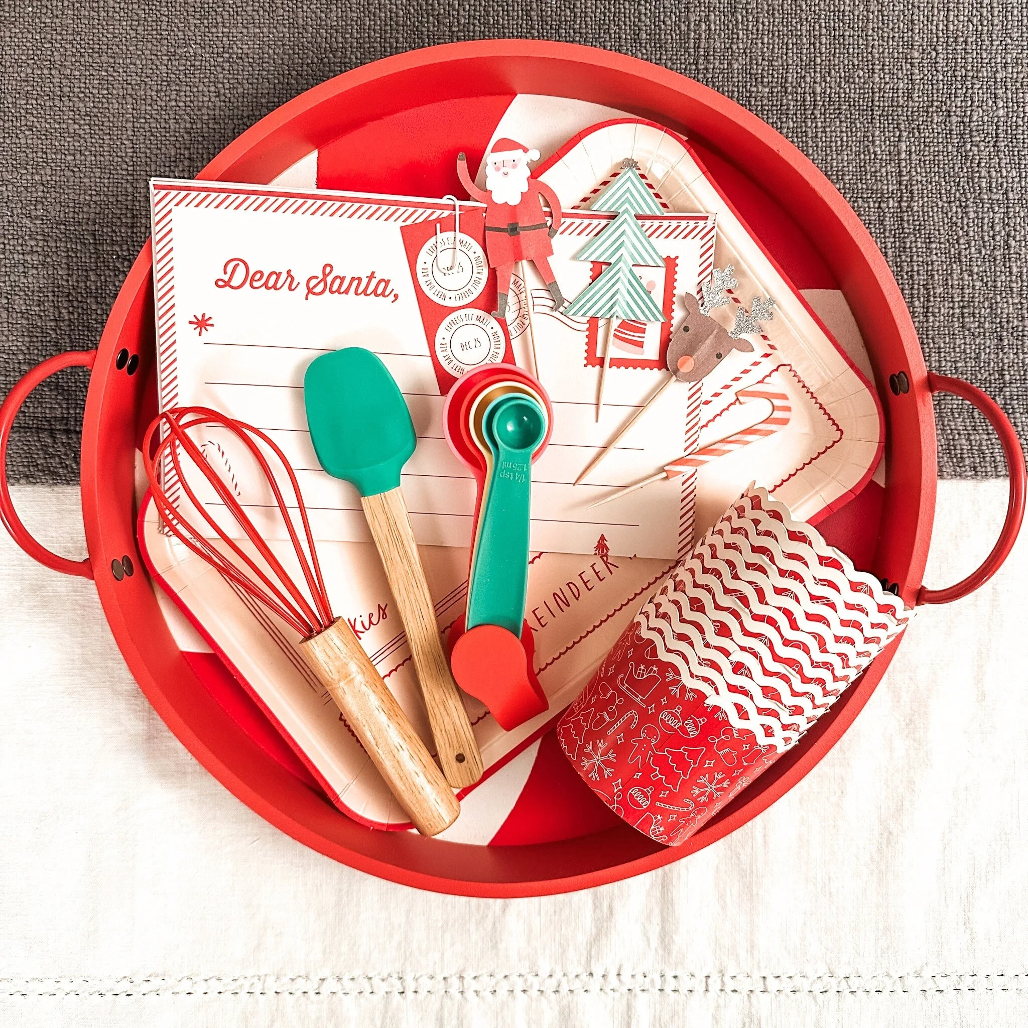 kids holiday cupcake baking kit christmas character toppers, letters to santa, santas cookies plate, mini whisk, spatula, measuring spoons, and festive baking cups with wooden peppermint swirl tra.jpg
