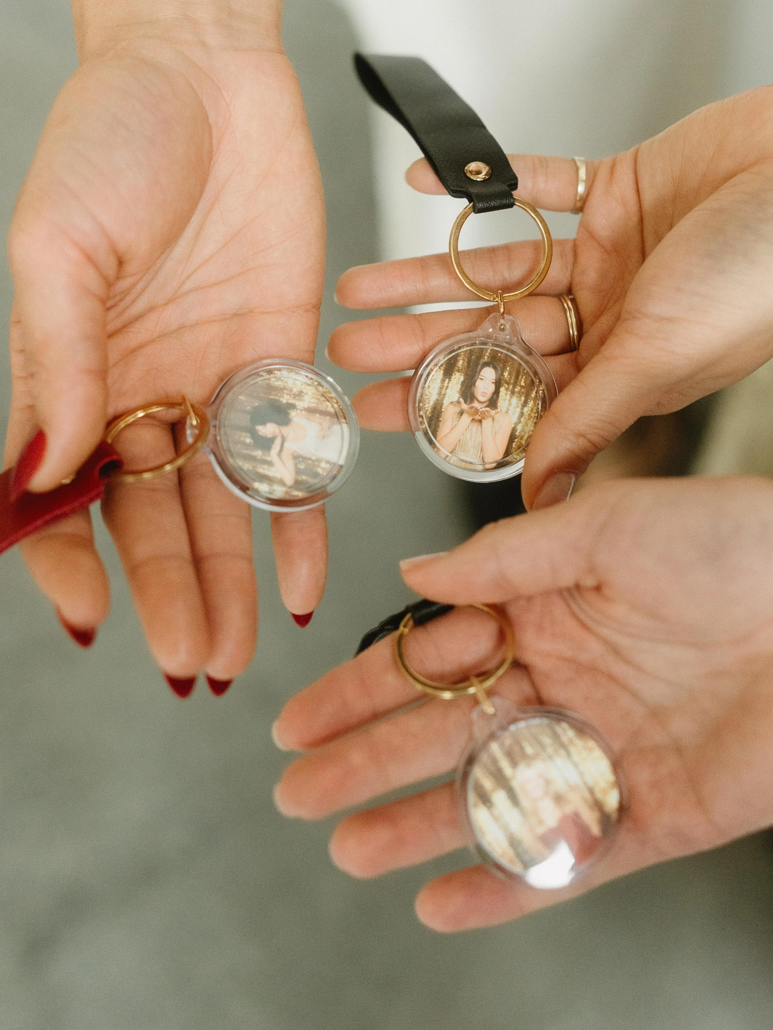 Your holiday party favor, but make it something people actually keep. ✨

These bag charm keychains are the move for Seattle corporate holiday parties this year &mdash; real photos from your event, snapped into a charm, clipped straight onto a bag or 