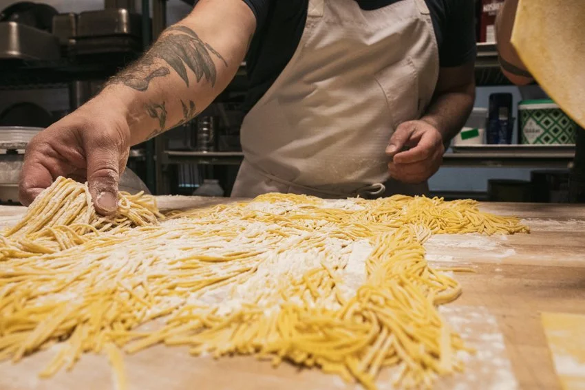 chef making pasta by hand