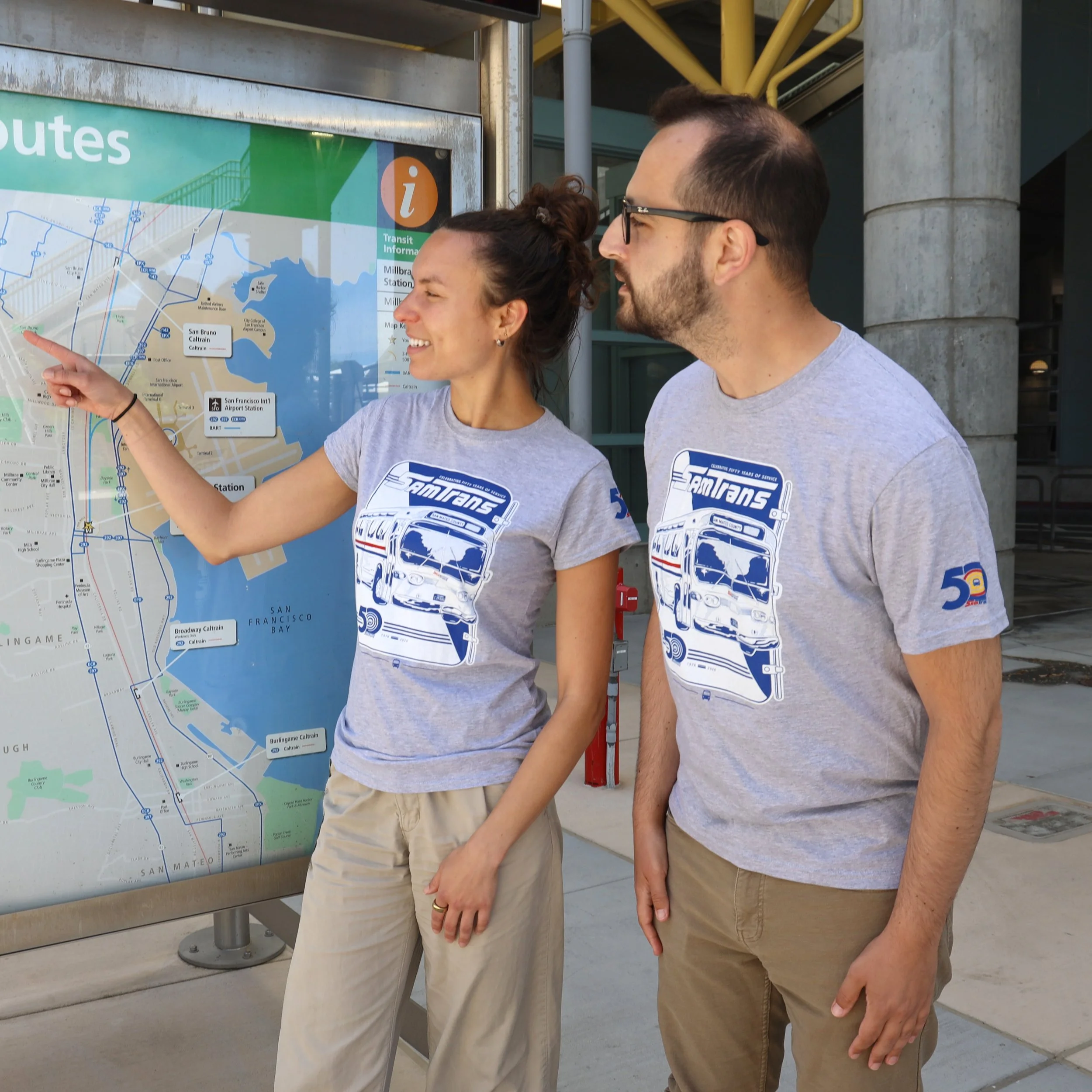 People wearing the SamTrans 50th Anniversary T-shirt