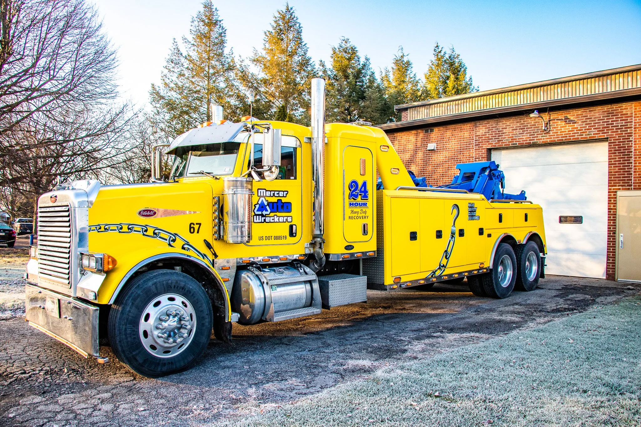 Yellow 3m Vehicle wrapped Peterbuilt with sleeper cab vinyl logos and additional graphics