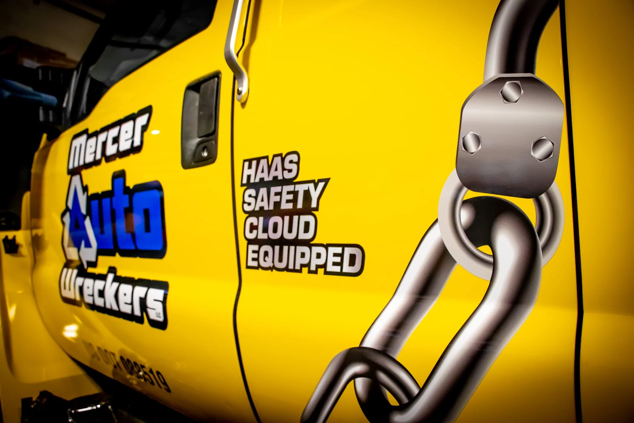 closeup of logos on vehicle wrap