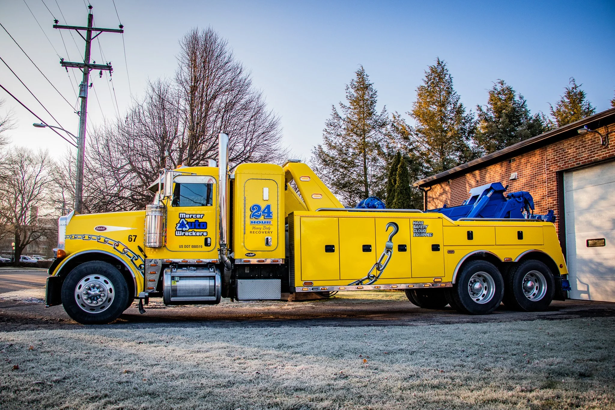 Yellow 3m Vehicle wrapped Peterbuilt with sleeper cab vinyl logos and additional graphics