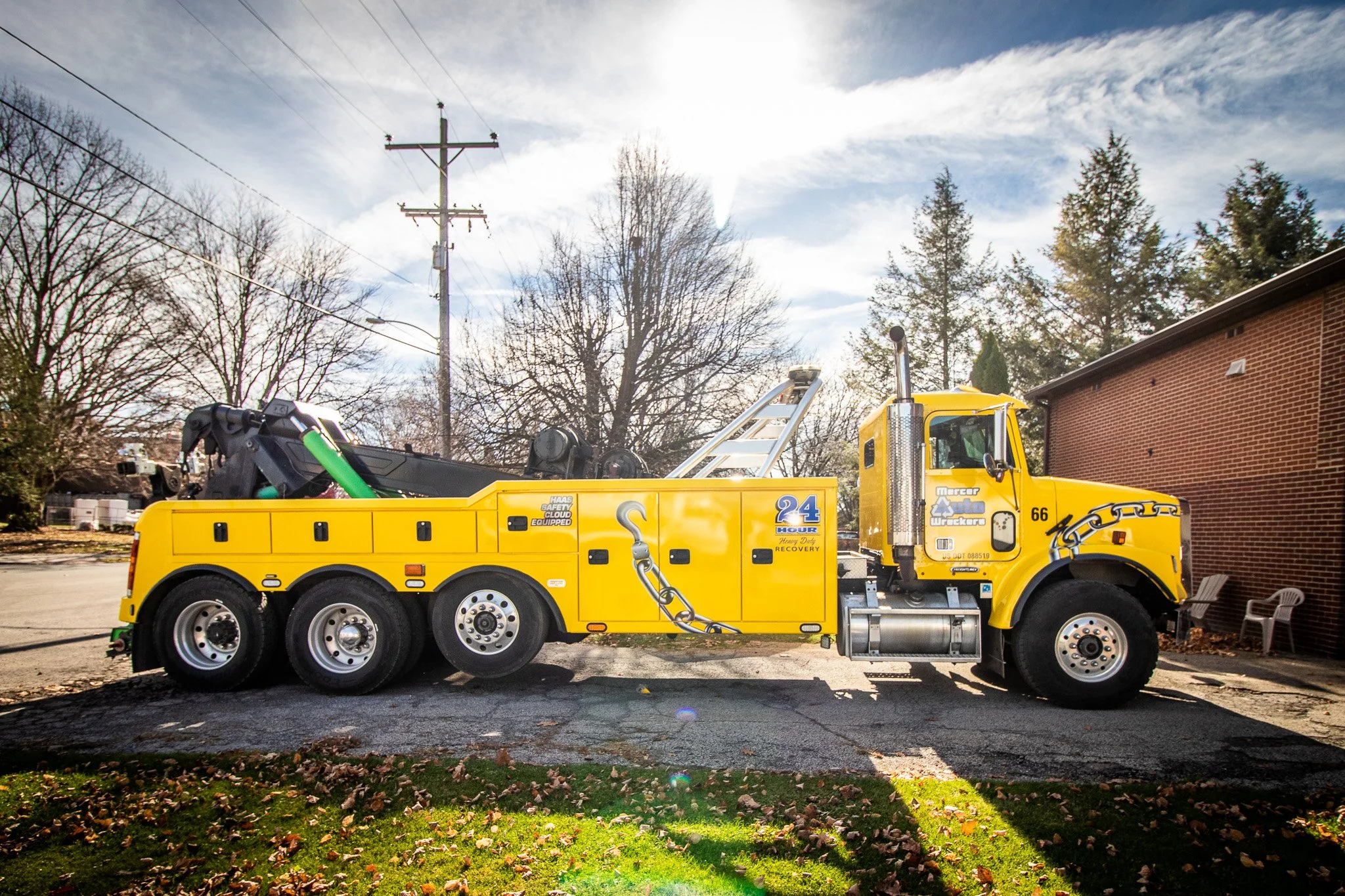 Yellow 3m Vehicle wrapped Peterbuilt with vinyl logos and additional graphics