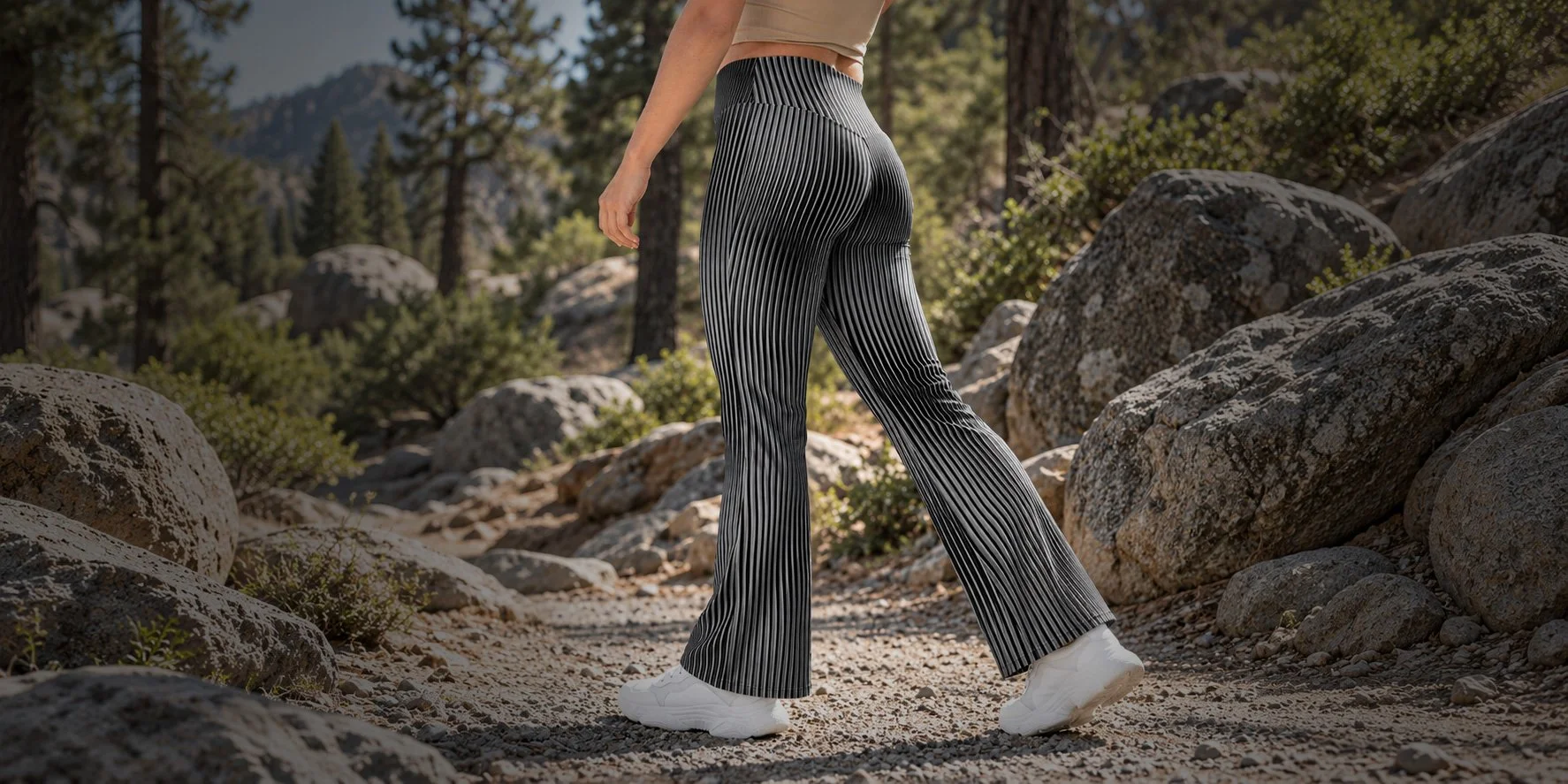 Stone Moiré Flare Leggings by Trice Co., worn walking a rocky trail