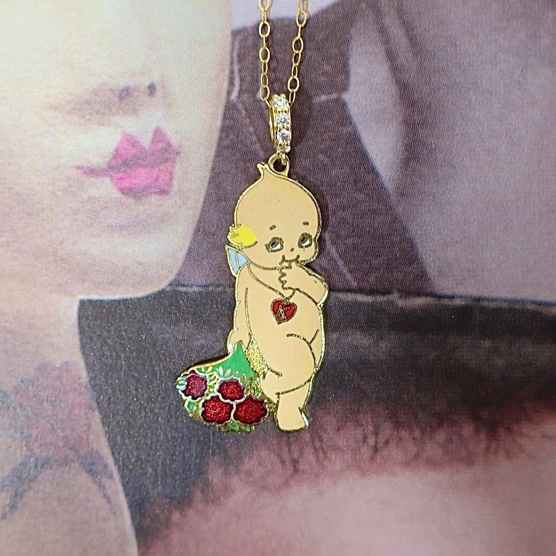 VINTAGE KEWPIE WITH ROSES NECKLACE