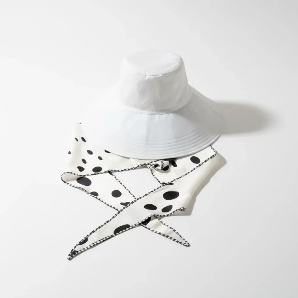 sunhatwhitepolka_fb1281ae-467f-41eb-be84-f21b9d7a7a21.heic.webp
