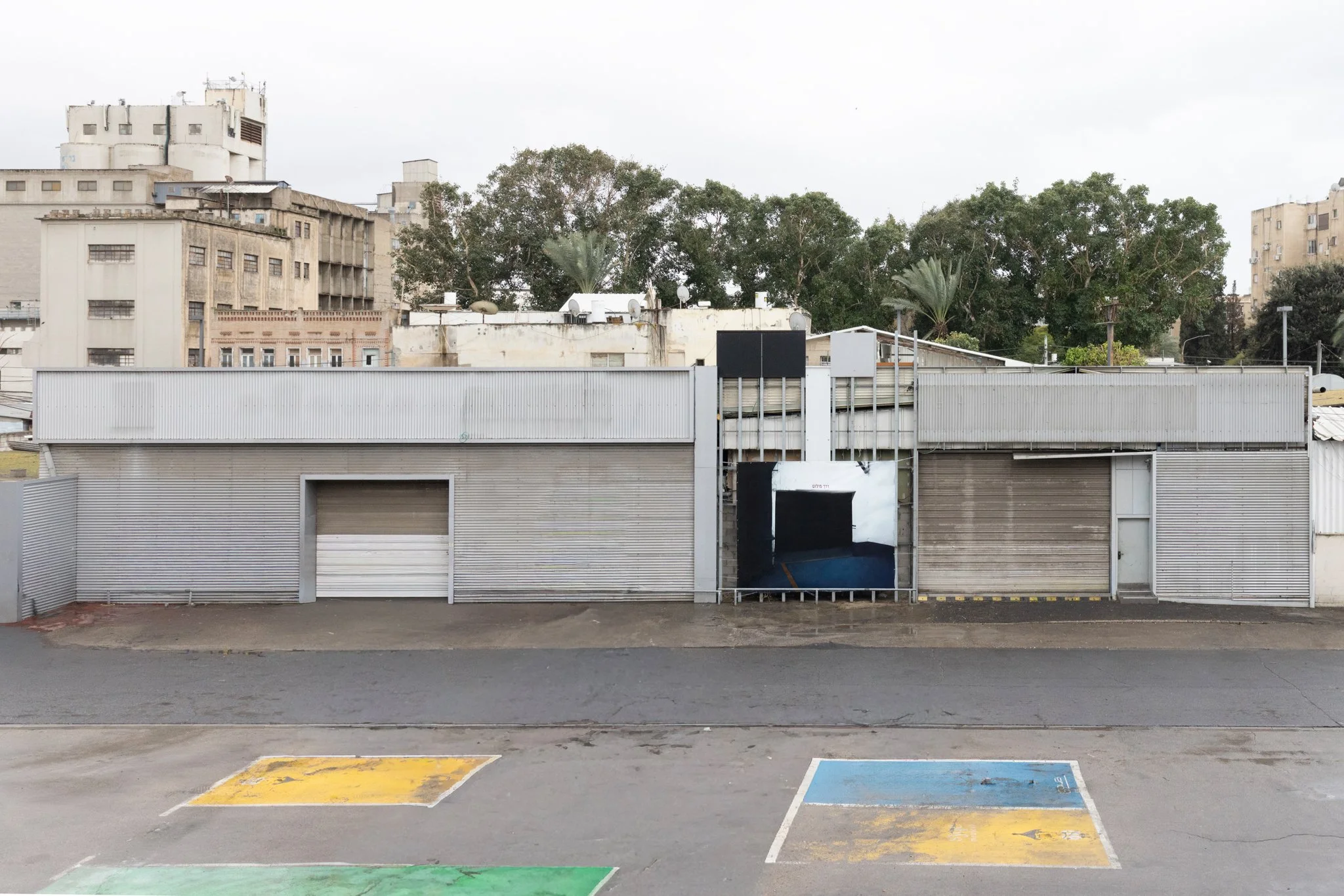 Installation View | Edmond De Rothschild Foundation Residency Program | Escape Route (2025) | Public Space Installation | HatHiya 14 Complex | Open Studio | Analog color photograph | Vinyl banner | 425 x 354 cm
