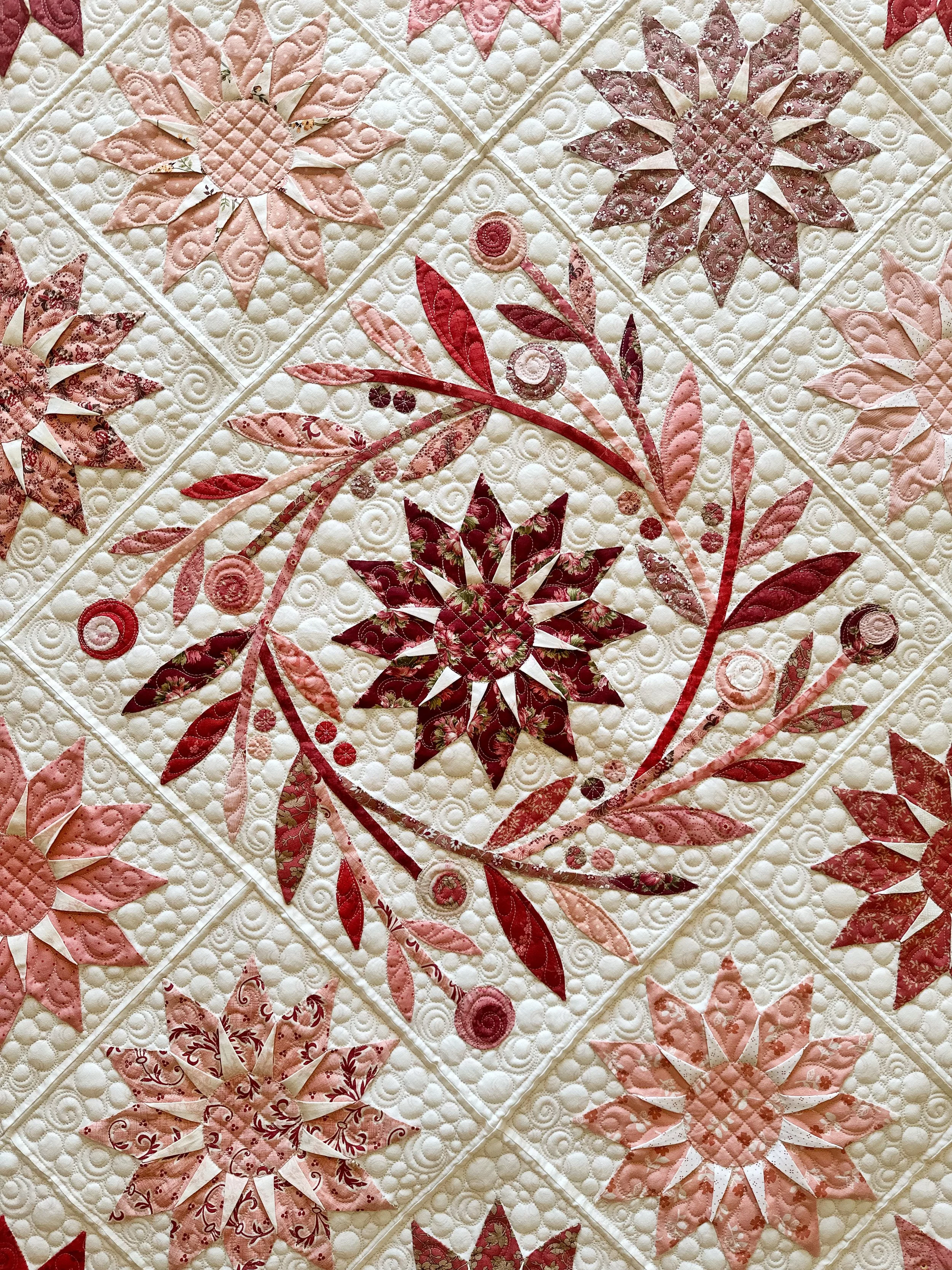 Kathy’s amazing Blooming Star Quilt