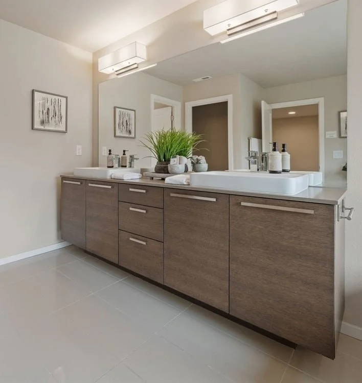 Essential Home Staging - Home Staging in Seattle Bellevue and Puget Sound - home staging portfolio listing photo of bathroom with double vanity staged by Essential Home Staging