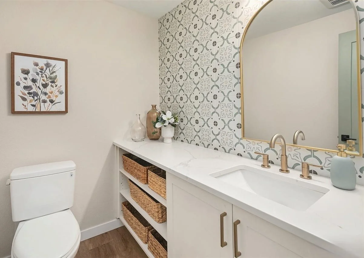 Essential Home Staging - Home Staging in Seattle Bellevue and Puget Sound - home staging portfolio listing photo of bathroom with tile wall and shelves staged by Essential Home Staging