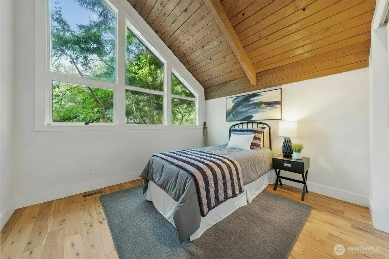 Essential Home Staging - Home Staging in Seattle Bellevue and Puget Sound - home staging portfolio listing photo of boy kid child bedroom staged by Essential Home Staging