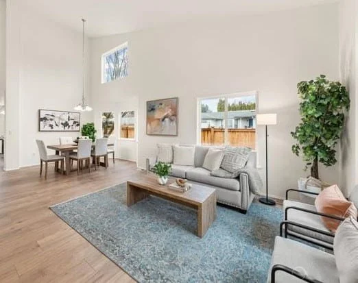 Essential Home Staging - Home Staging in Seattle Bellevue and Puget Sound - home staging portfolio listing photo of Federal Way living room and dining room staged by Essential Home Staging